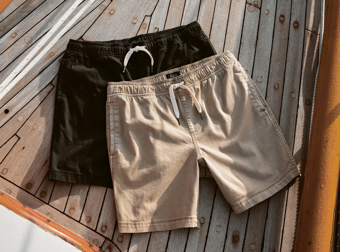 EDITORIAL IMAGE OF TWO PAIRS OF CRUZ SHORTS LAYED ON TOP OF EACH OTHER