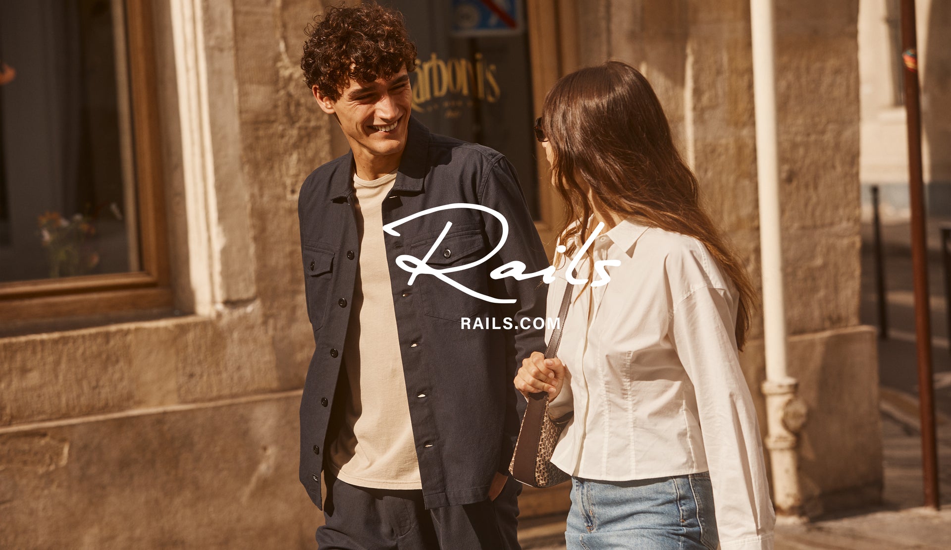 EDITORIAL IMAGE OF TWO MODELS WALKING. FIRST MODEL IS WEARING KEROUAC SHIRT JACKET. SECOND MODEL IS WEARING ANABELE TOP