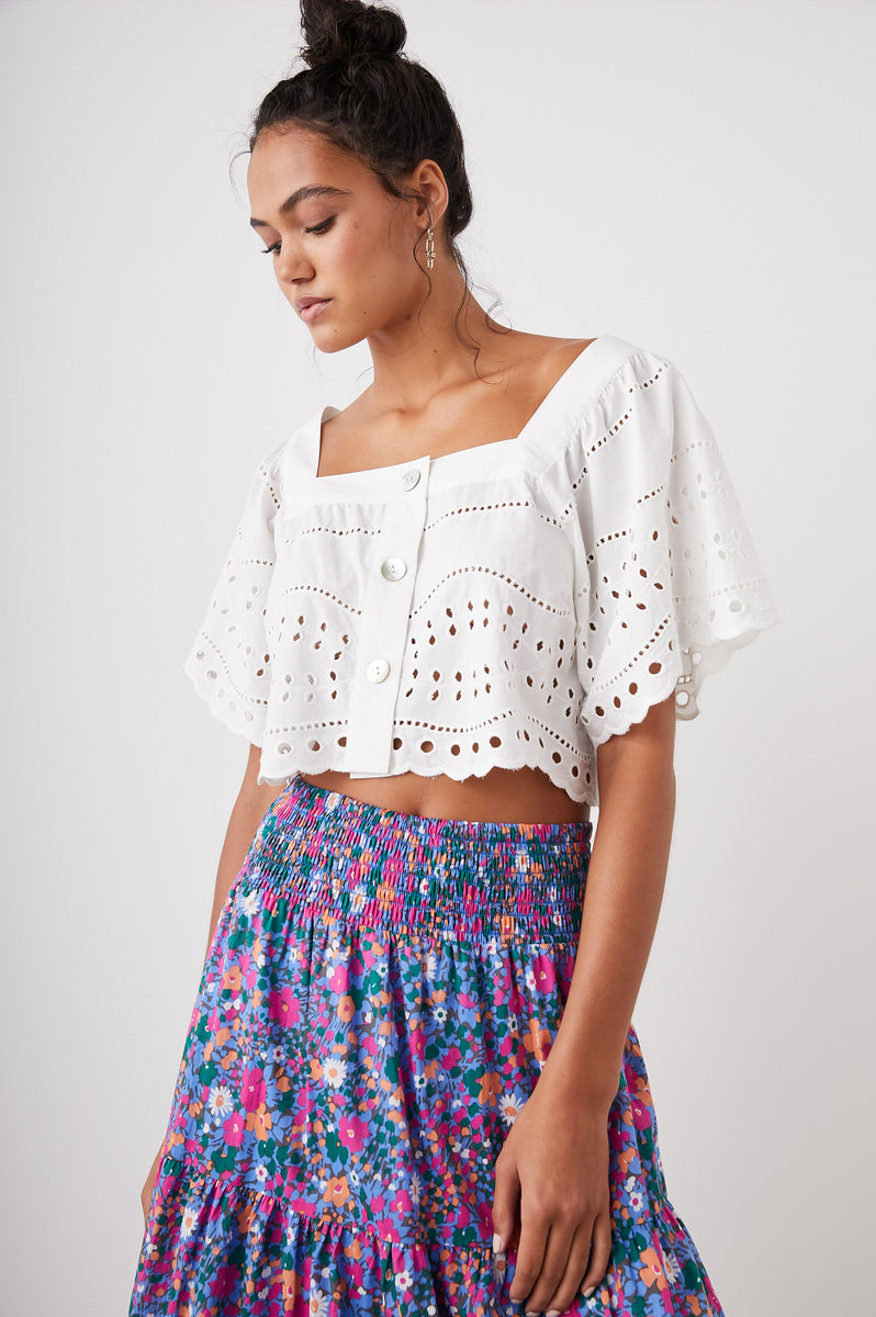 white eyelet ruffle top