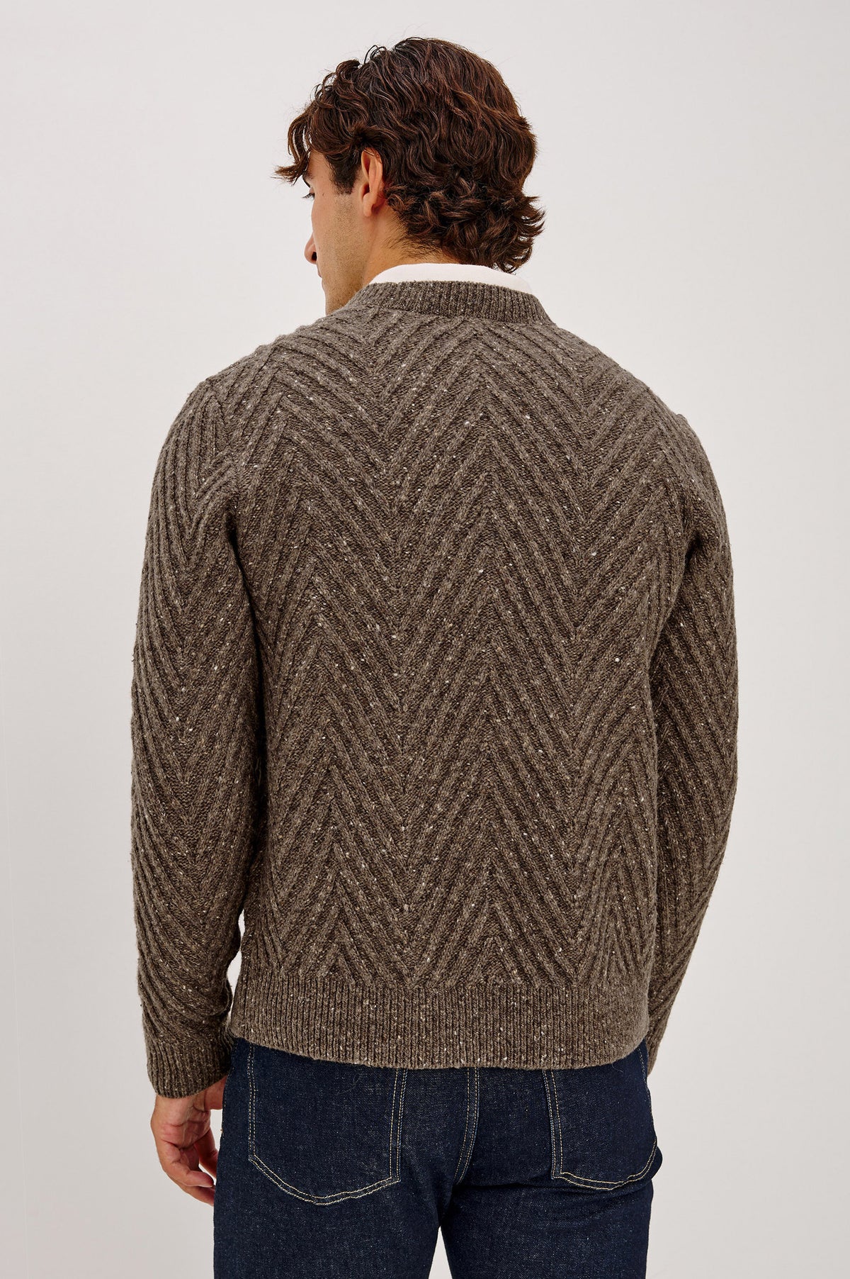 Adair Cardigan in Alpaca Wool Nylon Blend With Chevron Texture, V-Neck, Front Buttons, and Long Sleeves in Pine Log Colorway - Upper Body Back View Featured on Model
