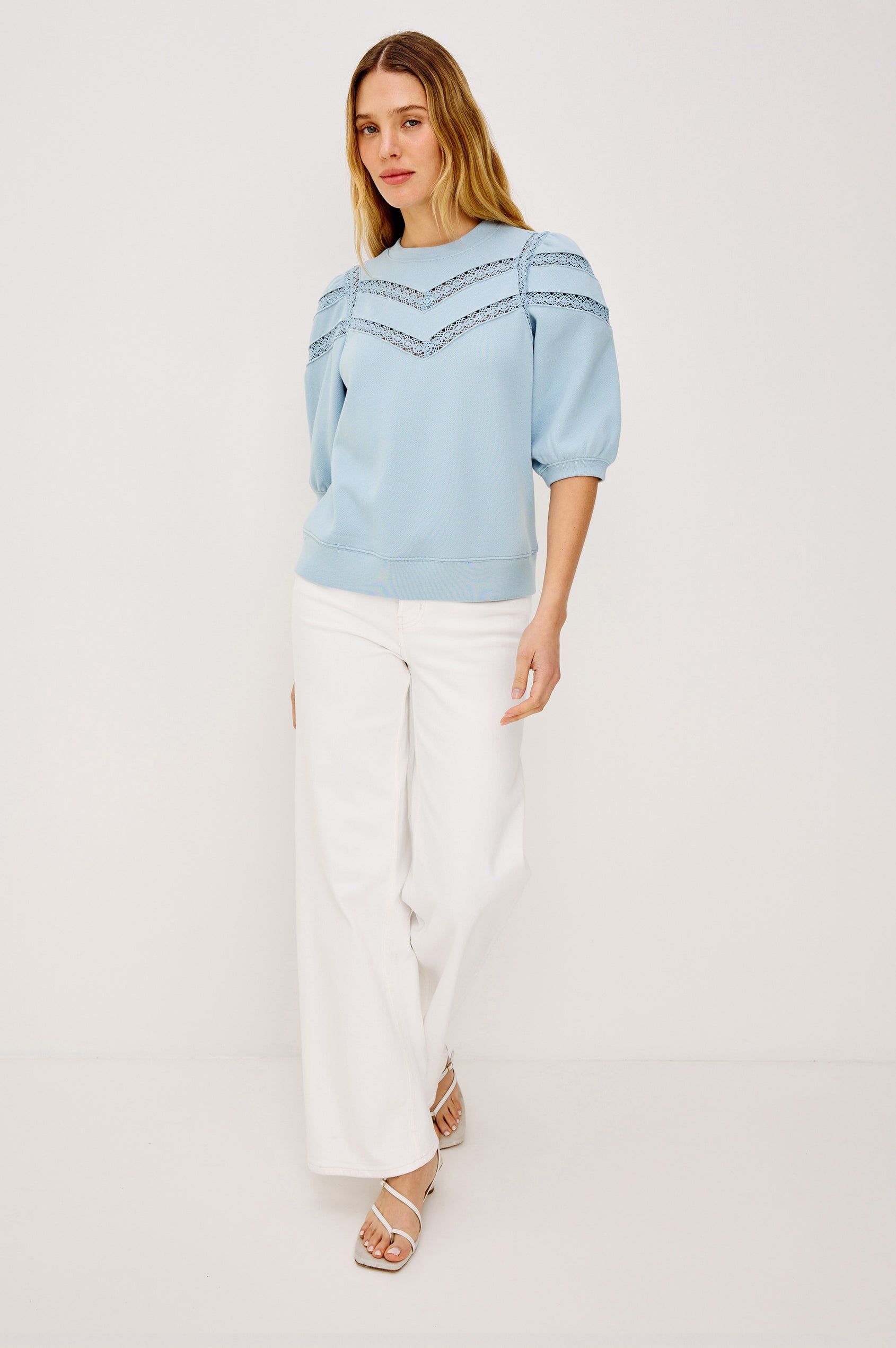 Adria Crewneck Top in French Terry With Sheer Crochet Insets at Front, Back, and Short Puff Sleeves in Sky Colorway - Upper Body Back View Featured on Model