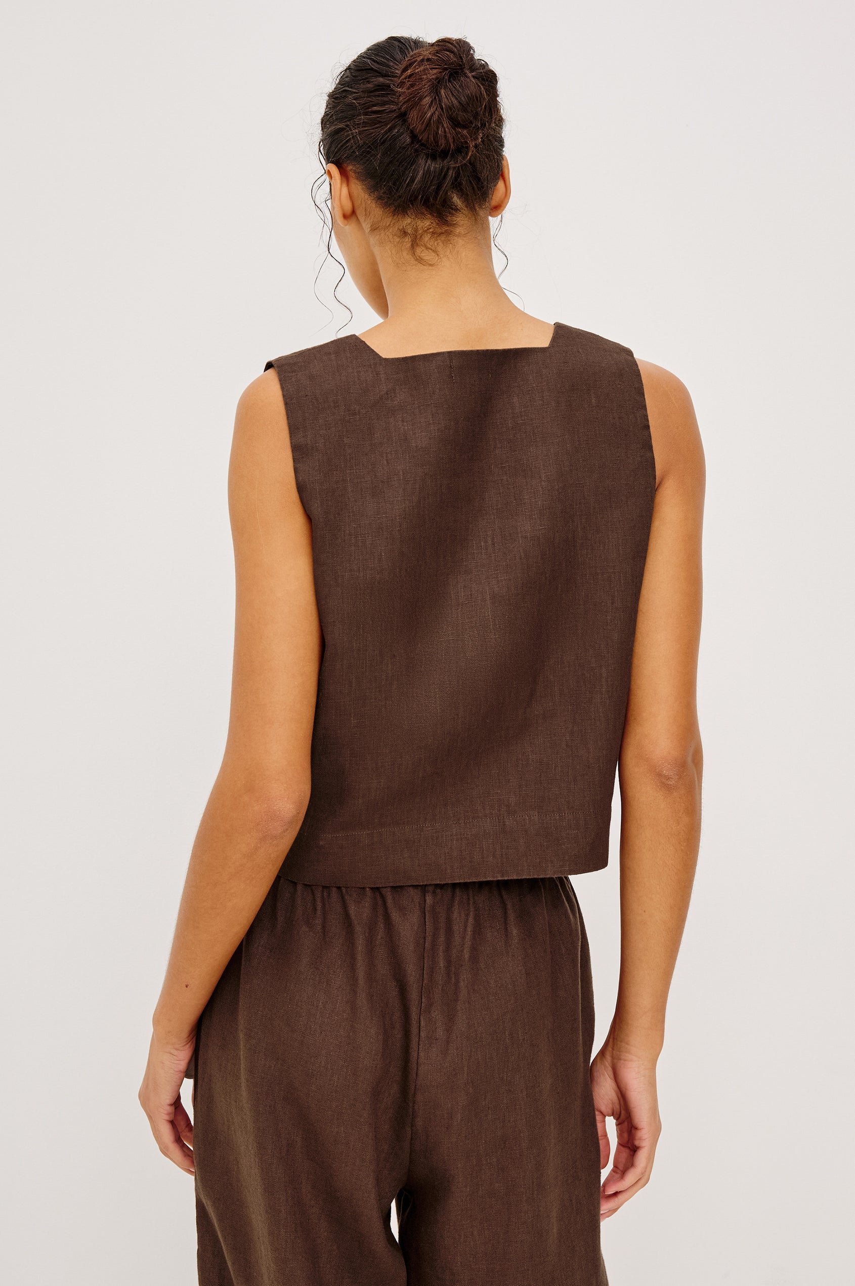 Akira Tank Top in Linen With Square Neckline Wide Fixed Shoulder Straps and Cropped Loose Fit in Espresso Colorway - Upper Body Back VIew Featured on Model