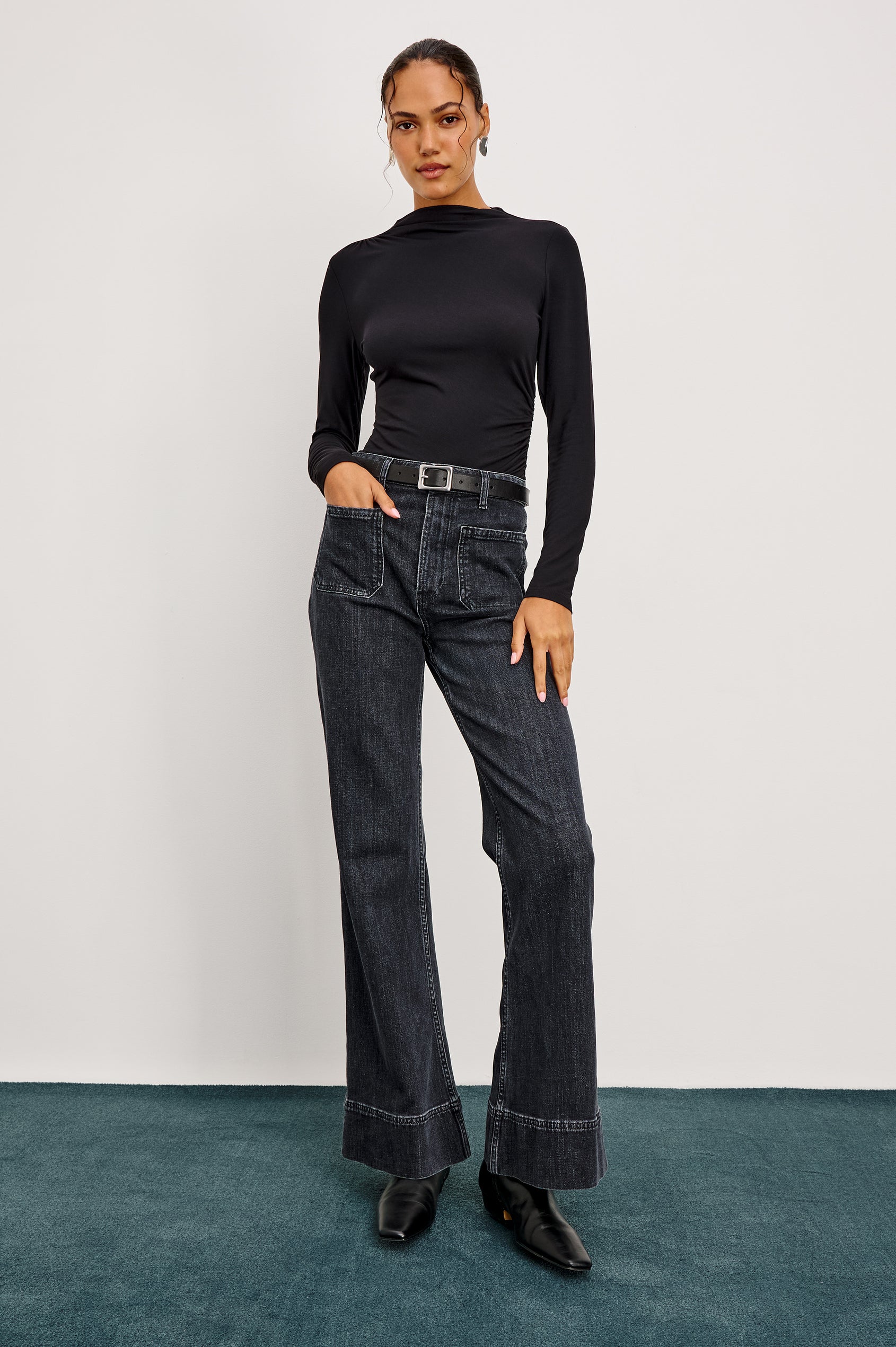 Alamitos high waisted denim trouser with flared leg and front patch pockets in Black Pearl colorway- front full body view on model
