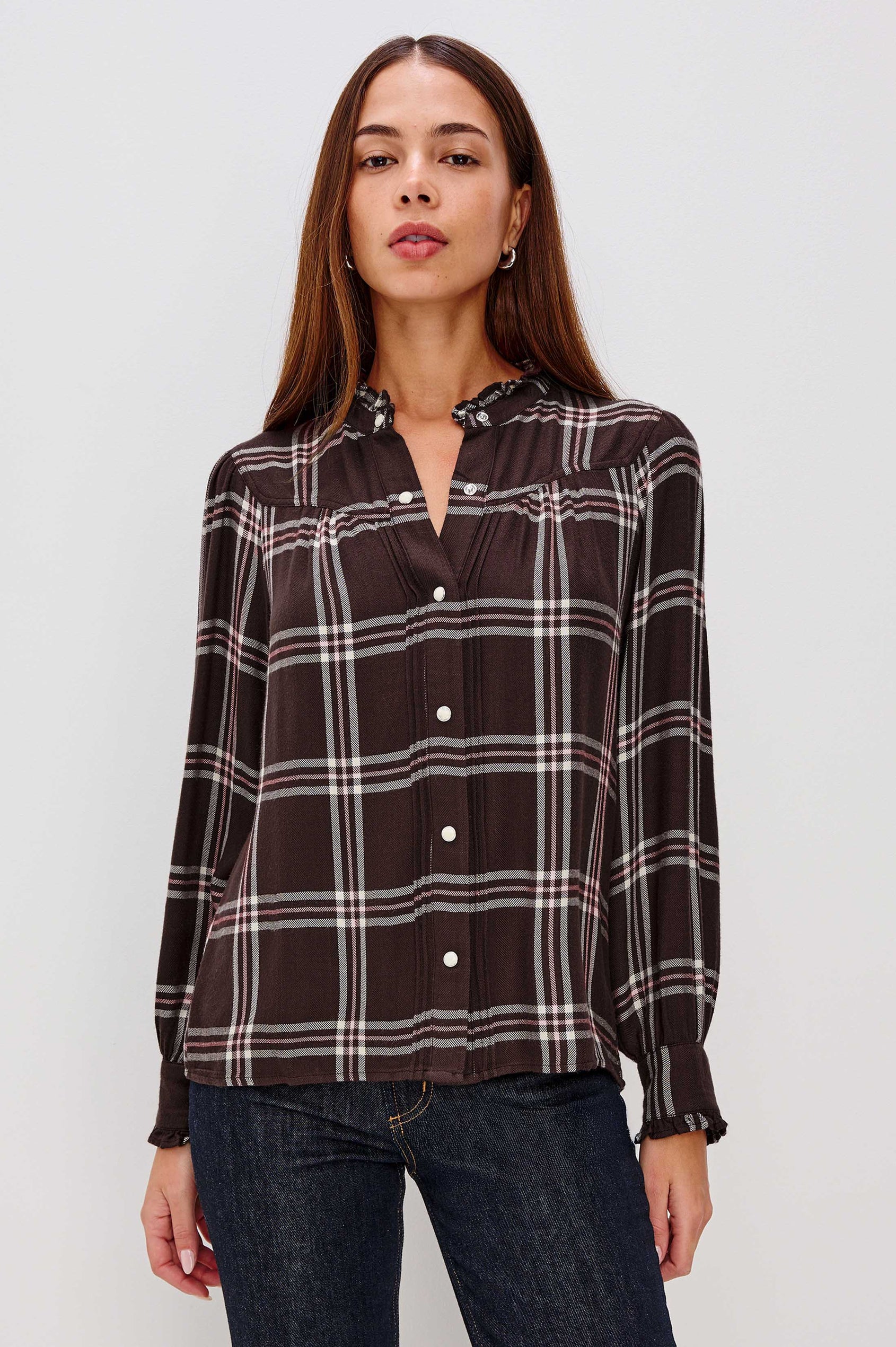 Alanna Long Sleeve Shirt with Snaps Down the Front, a Ruffled Collar, Banded Ruffed Cuffs, and Pleats at the Yoke Seam in Chocolate Napoleon Colorway - Front Untucked View On Model