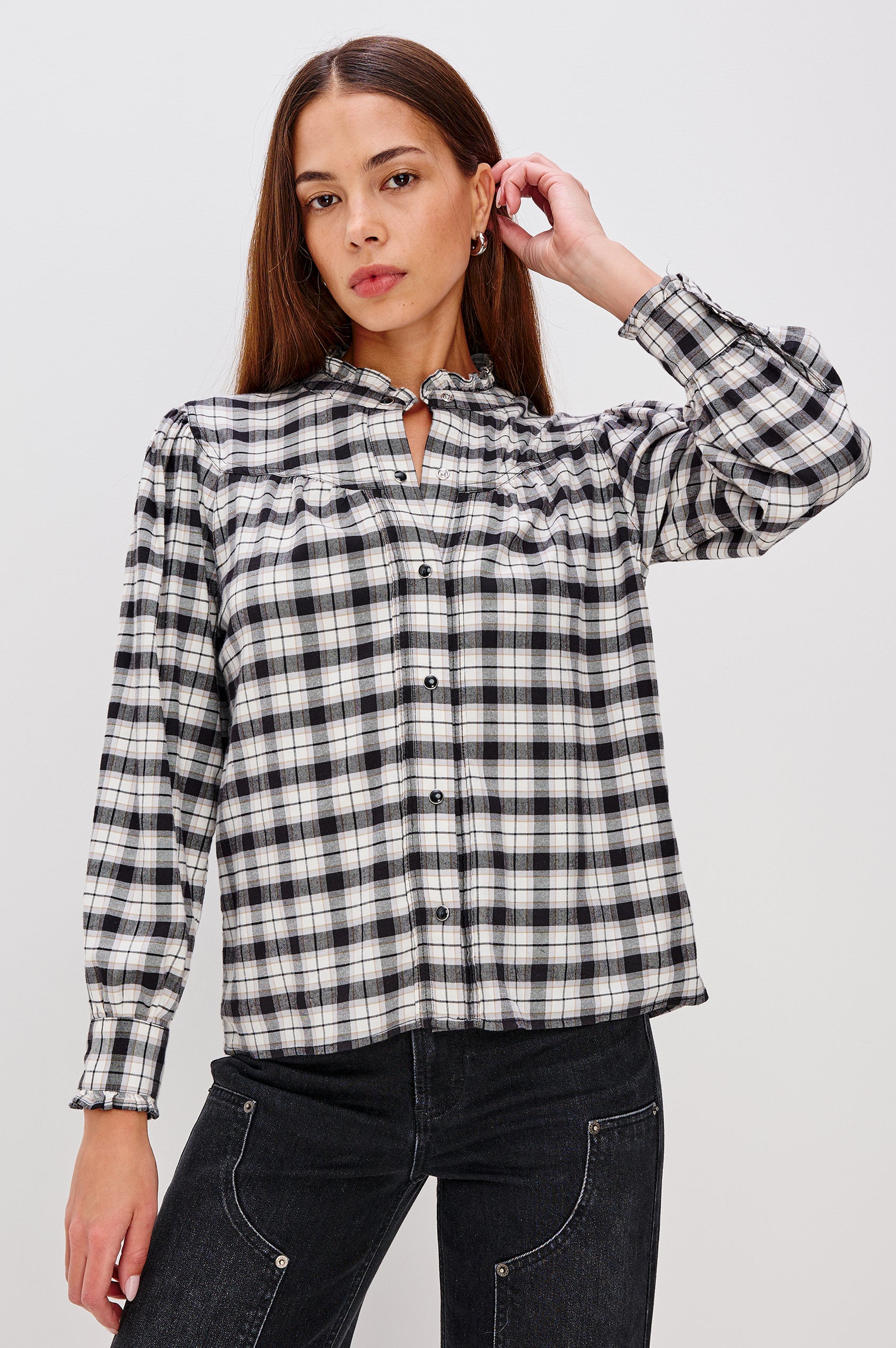 Alanna Long Sleeve Shirt with Snaps Down the Front, a Ruffled Collar, Banded Ruffed Cuffs, and Pleats at the Yoke Seam in Ivory Smoke Onyx Colorway - Front Untucked View Featured on Model