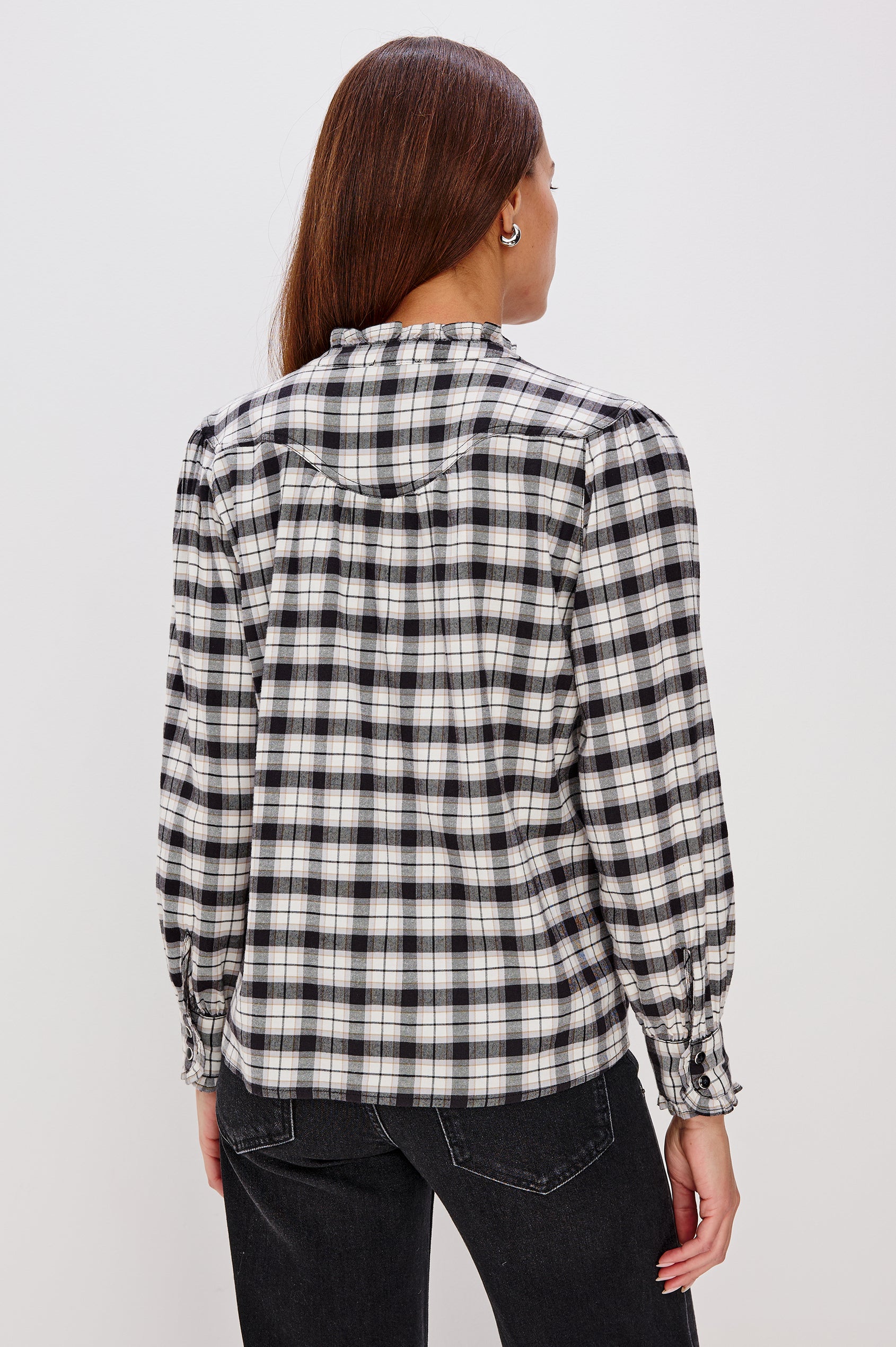 Alanna Long Sleeve Shirt with Snaps Down the Front, a Ruffled Collar, Banded Ruffed Cuffs, and Pleats at the Yoke Seam in Ivory Smoke Onyx Colorway - Back View Featured on Model