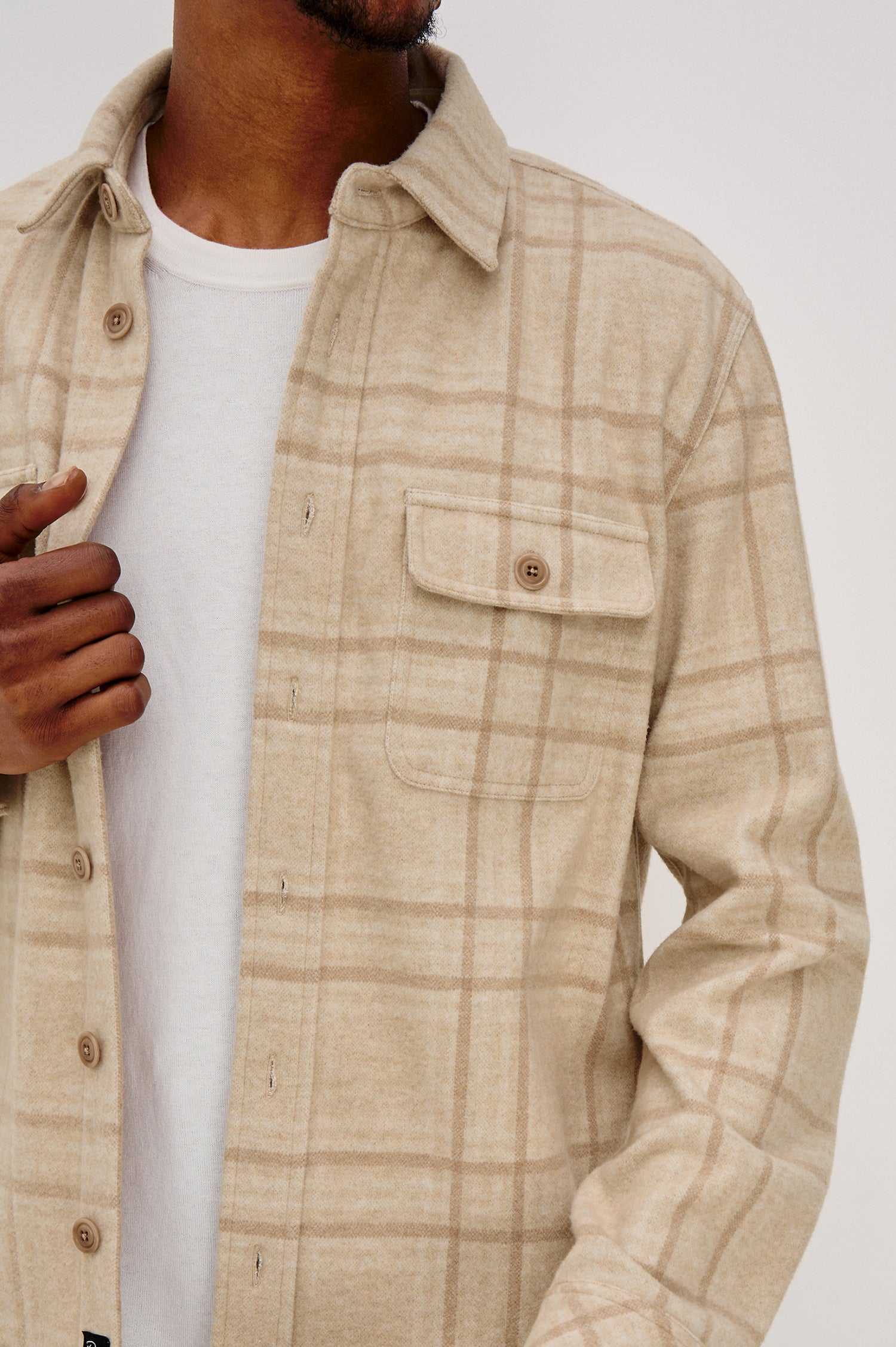 Alder Button Front Shirt in Brushed Stretch Cotton Blend With Collar, Buttoned Flap Chest Pockets, and Long Sleeves in Harvest Wheat Colorway - Upper Body Front Close Up View Featured on Model