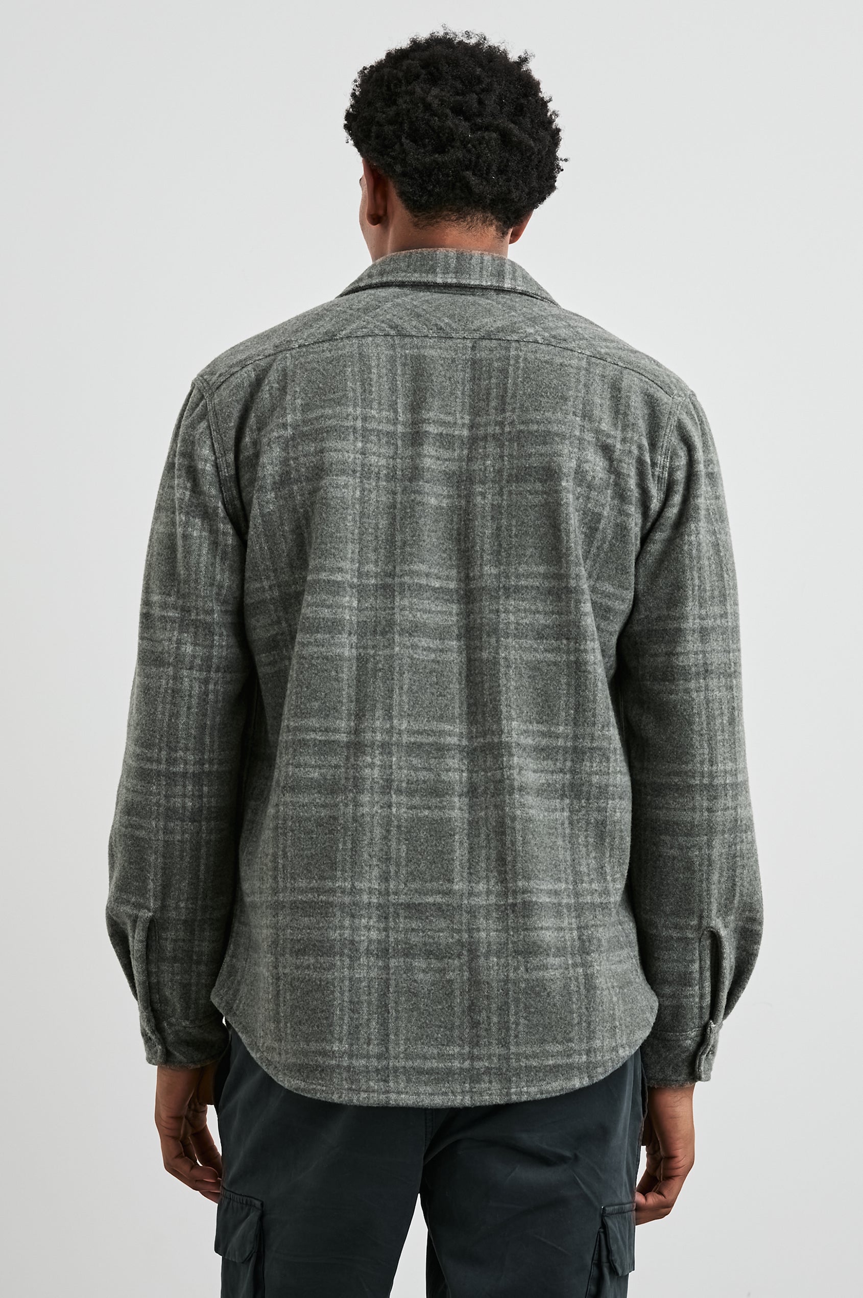 Alder Long-Sleeve Button up with Two Buttoned Chest Flap Pockets in Mossy Glen Colorway, a plaid - Back View Featured on Model