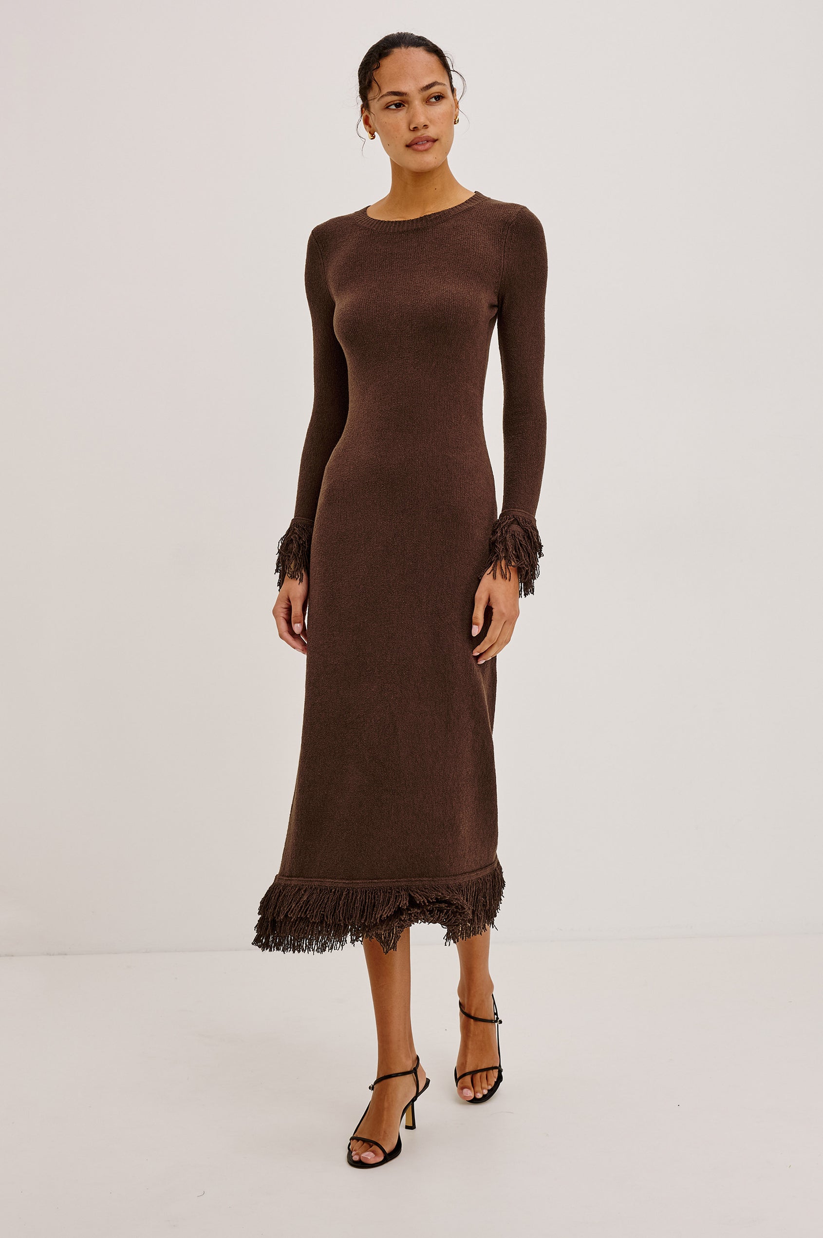 Alejandra Midi Dress in Silk Blend Knit With Fitted Body, Crew Neck, Long Sleeves, and Fringe Trim at the Cuffs and Straight Hem in Espresso Colorway - Full Body Front View Featured on Model