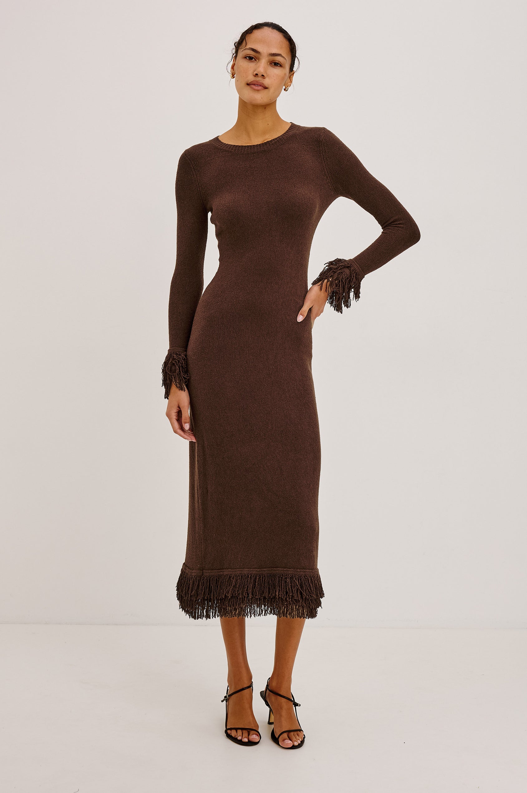 Alejandra Midi Dress in Silk Blend Knit With Fitted Body, Crew Neck, Long Sleeves, and Fringe Trim at the Cuffs and Straight Hem in Espresso Colorway - Full Body Front View Featured on Model