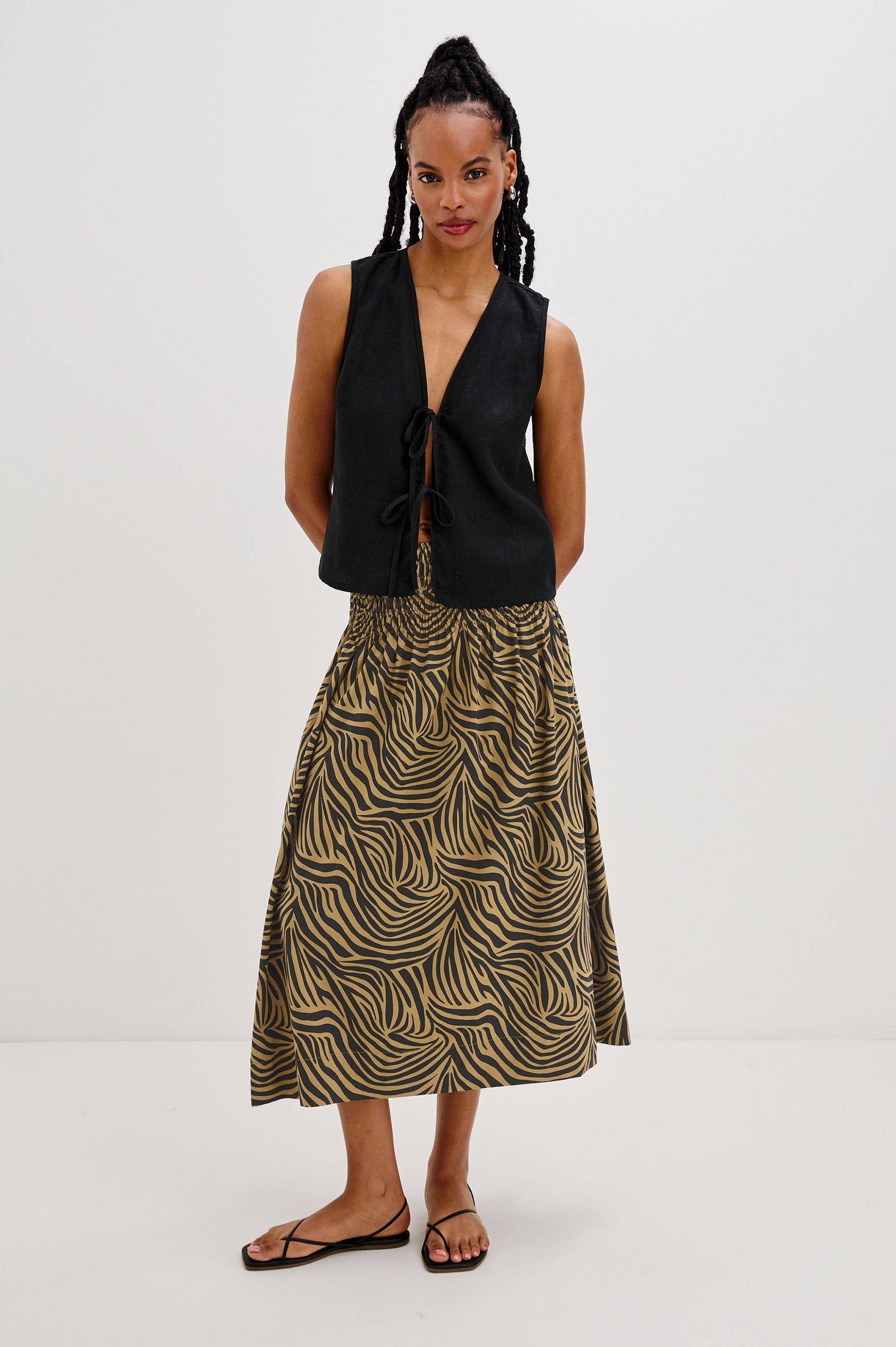 Alessa Midi Skirt with a Wide Elastic Gathered Waistband in Gold and Brown Cayman Colorway. Full Body Front View Shown on Model.