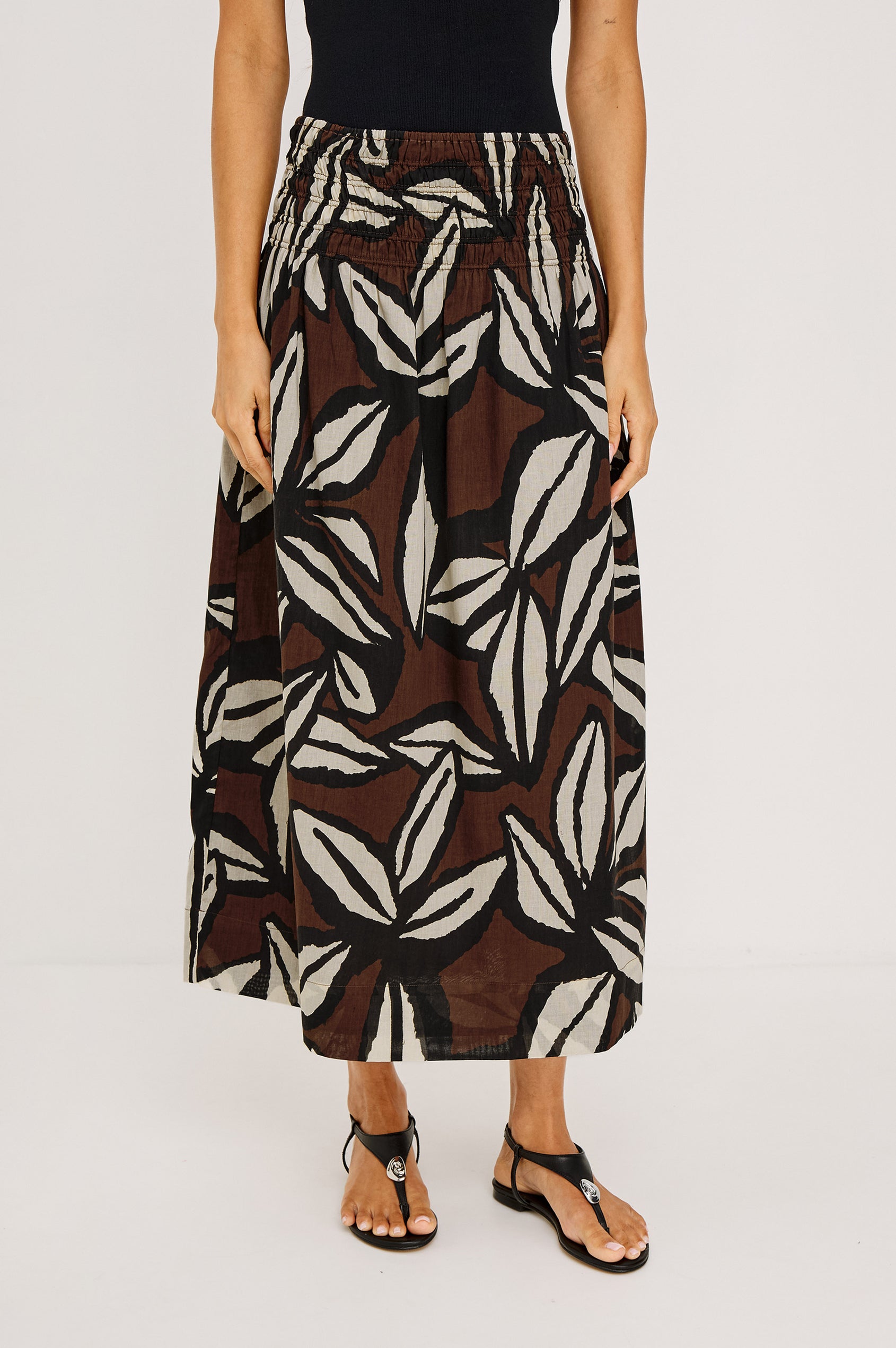 Alessa Midi Skirt in Heavy Linen With Wide Smocked Waistband and A-Line Silhouette in White Colorway - Lower Body Back View Featured on Model