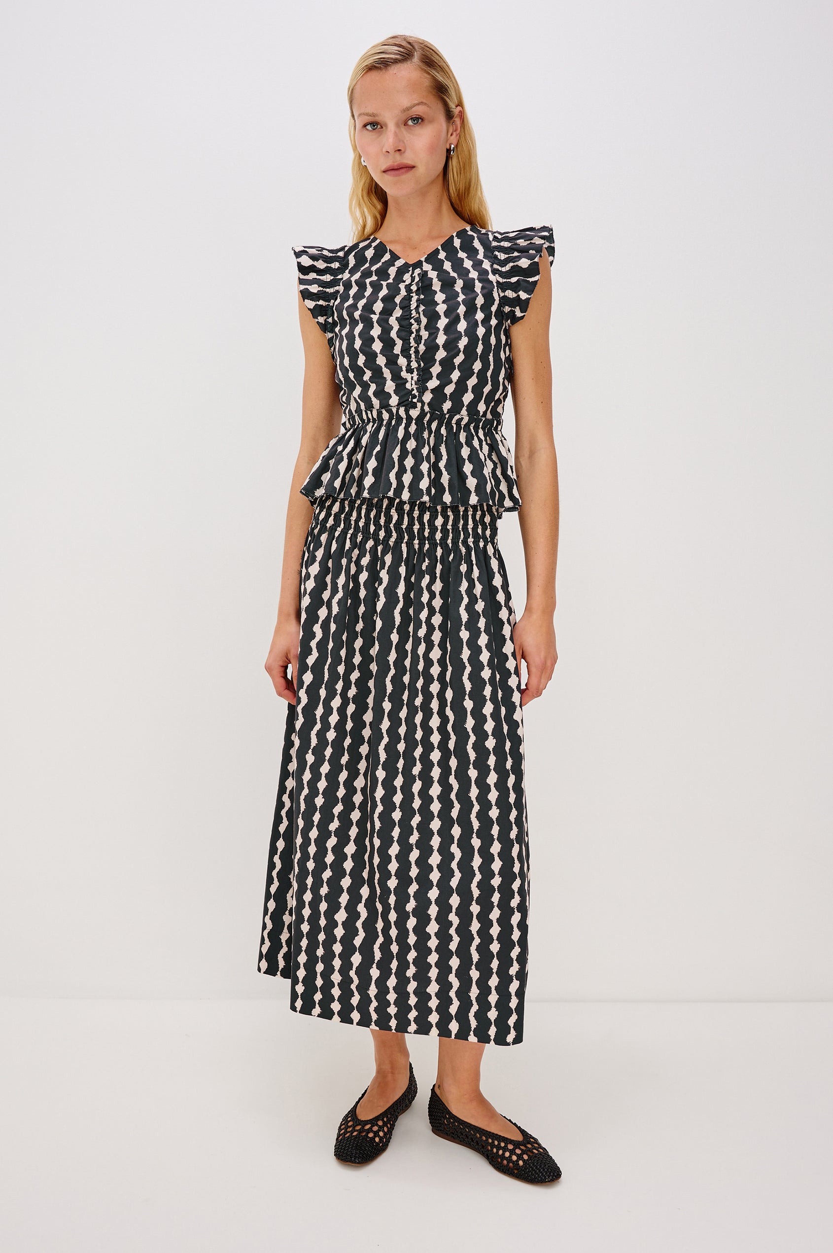 Alessa Midi Skirt with a Wide Elastic Gathered Waistband in Painted Noir Colorway. Front Full Body View Shown on Model.