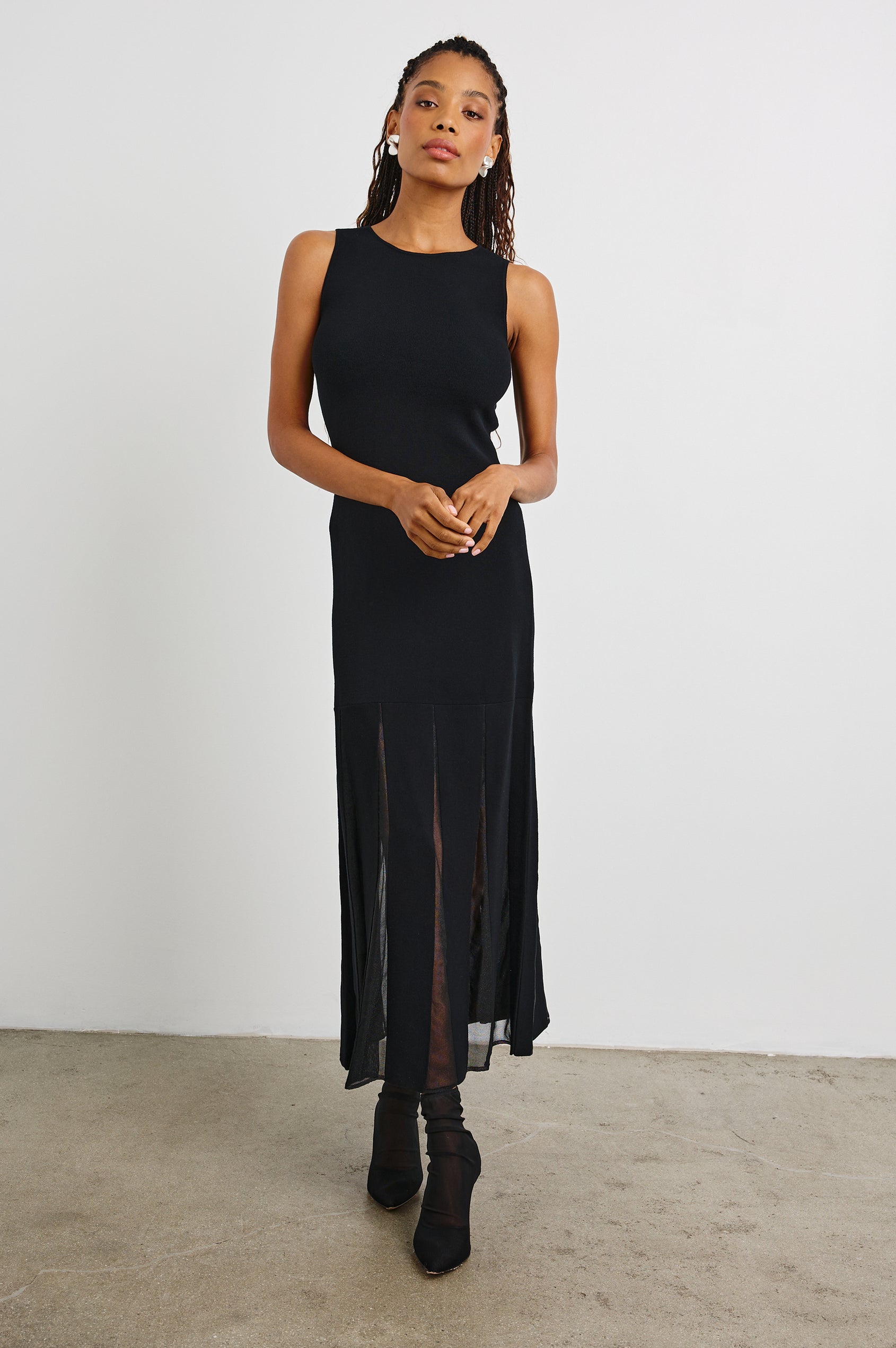 Alessia Sleeveless Maxi Dress with a Crew Neck and Sheer Vertical Inserts along the Hem from the Mid-Thigh in Black Colorway - Front Full Body View Featured on Model 