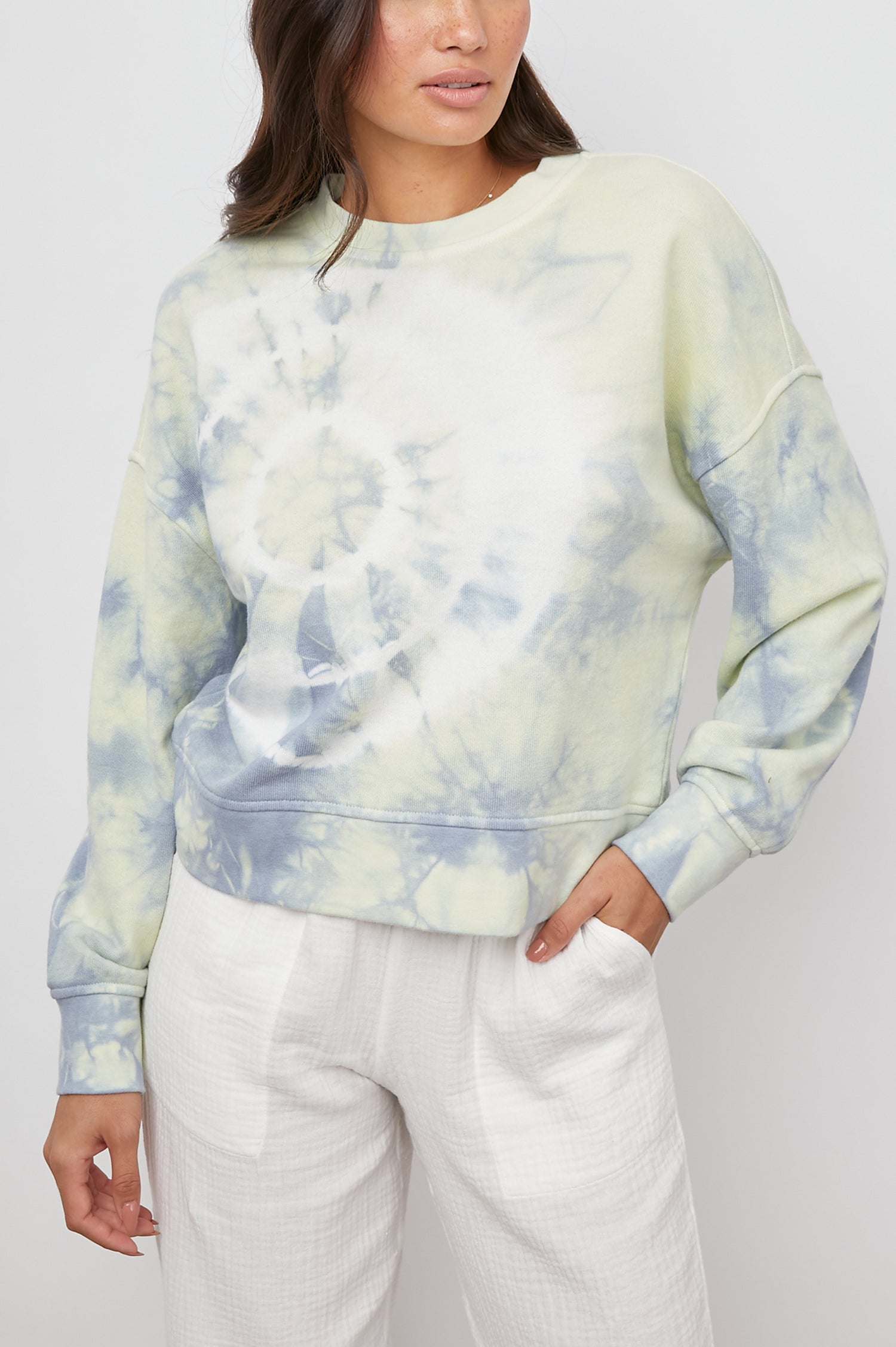 Alice & Jane Set with a Sweatshirt and Shorts with Two Front Pockets and One Back Patch Pocket in Laguna Colorway, a Tie Die in Blue, Yellow and White - Front Sweatshirt View Featured on Model 