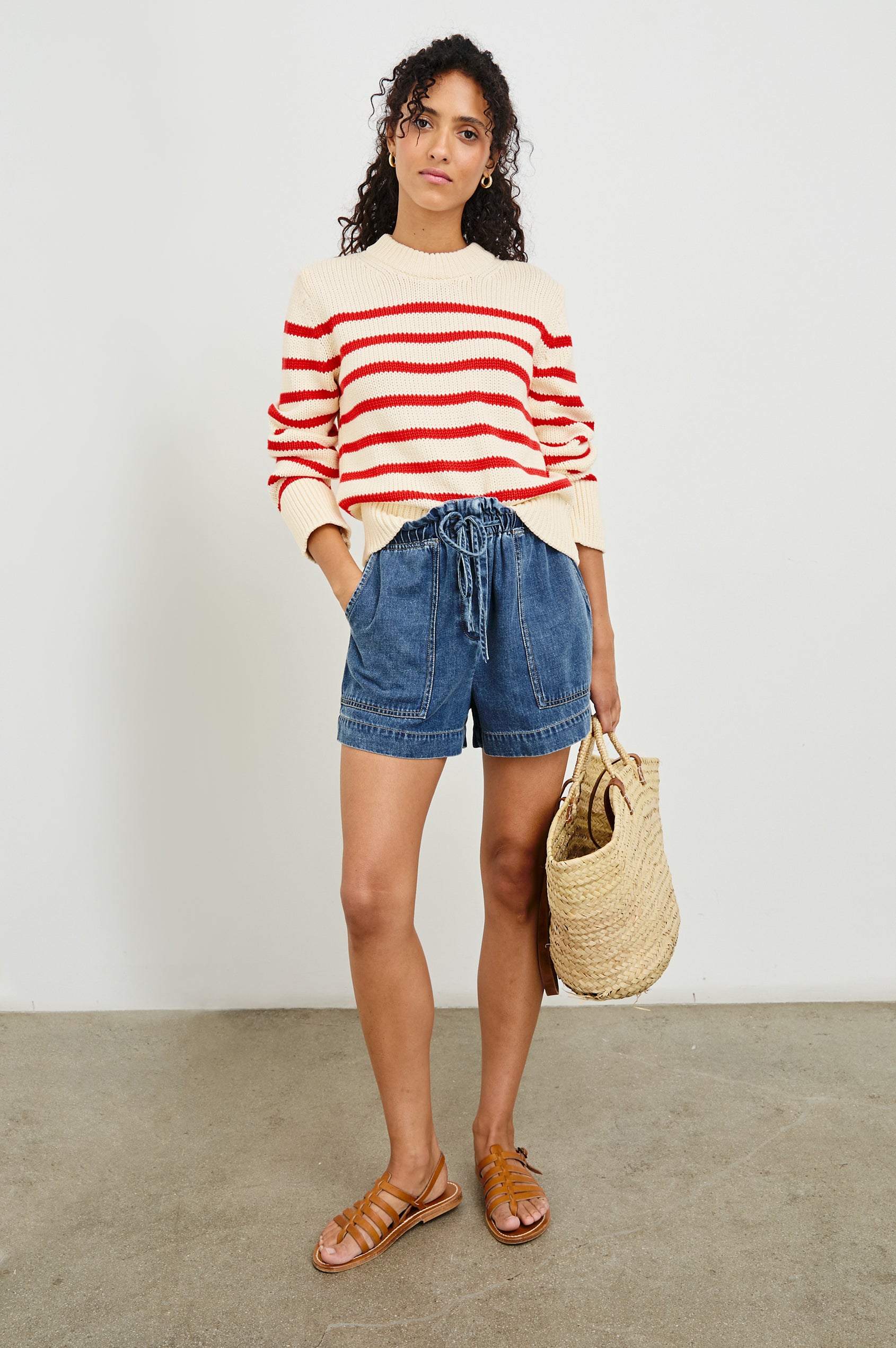 Alise crewneck wool sweater with ribbed detailing on cuffs and collar in Cherry Stripe - full body front view on model