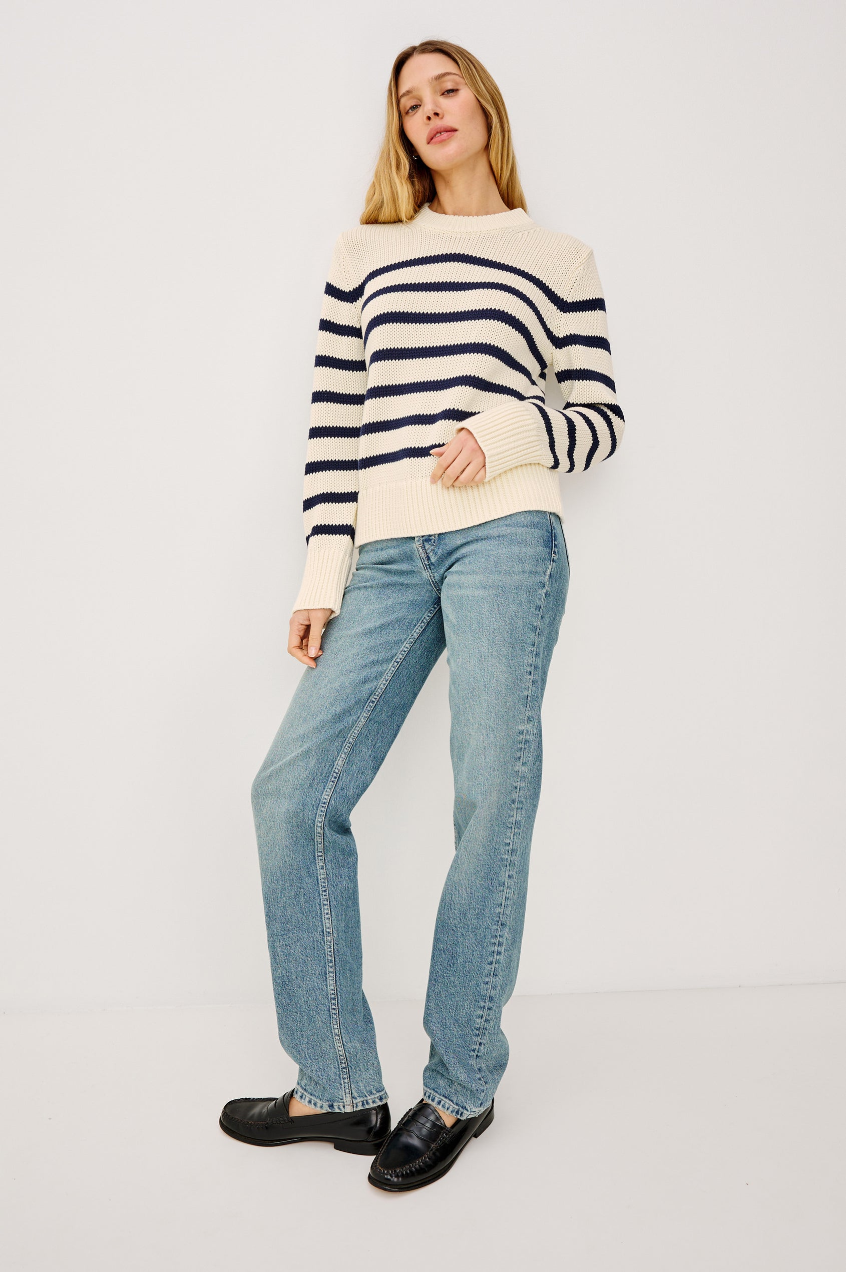 Alise Sweater in 100% Cotton Yarn With Ribbed Collar and Cuffs, Crew Neckline, and Long Sleeves in Ivory Navy Stripe Colorway - Upper Body Front View Featured on Model