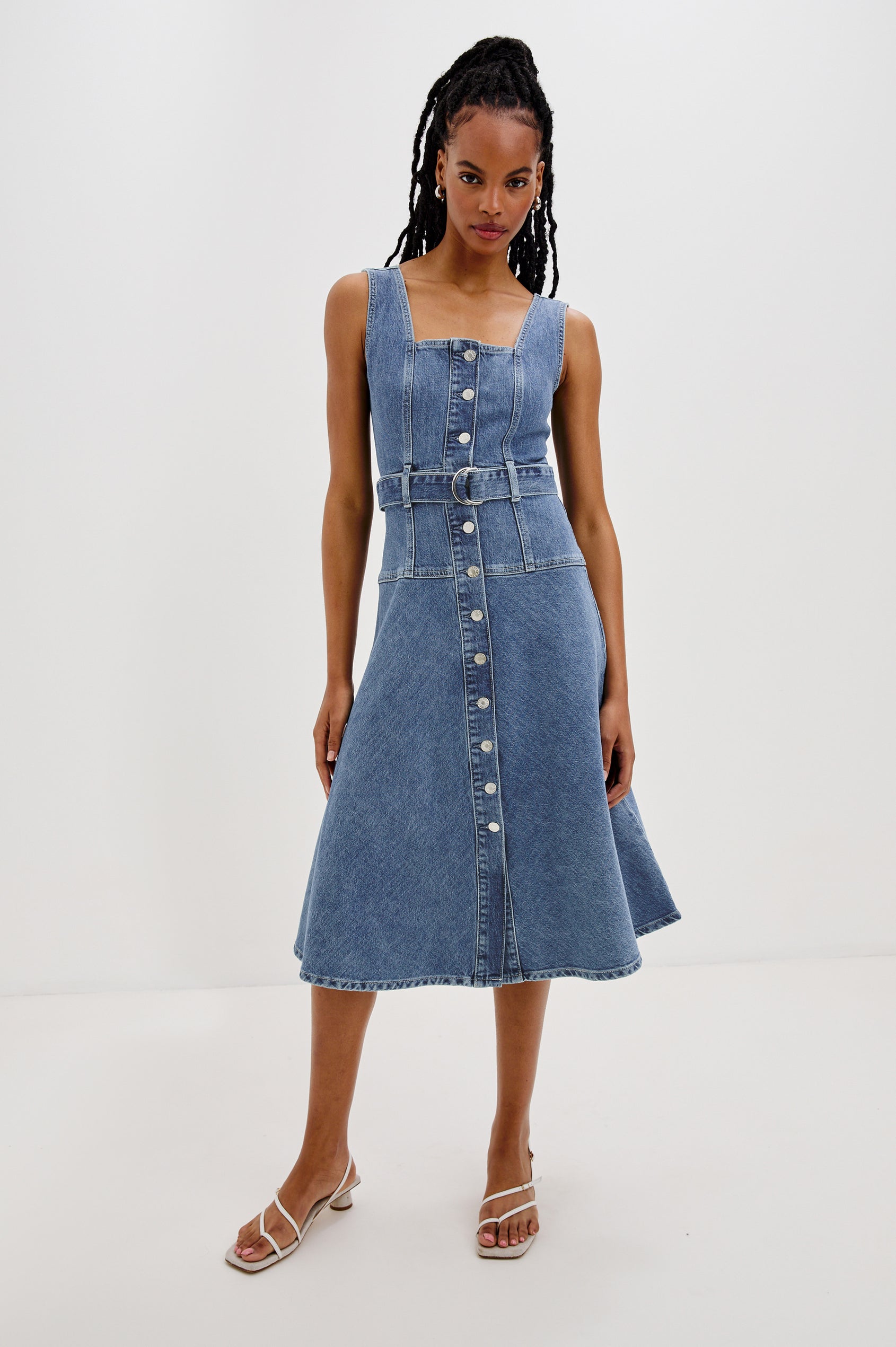 Aliso Denim Midi Dress with Square Neckline, Exposed Button Front, Belt Loops and a Self Belt with Metal D-Ring in Pacific Coast Colorway. Front View Shown on Model.