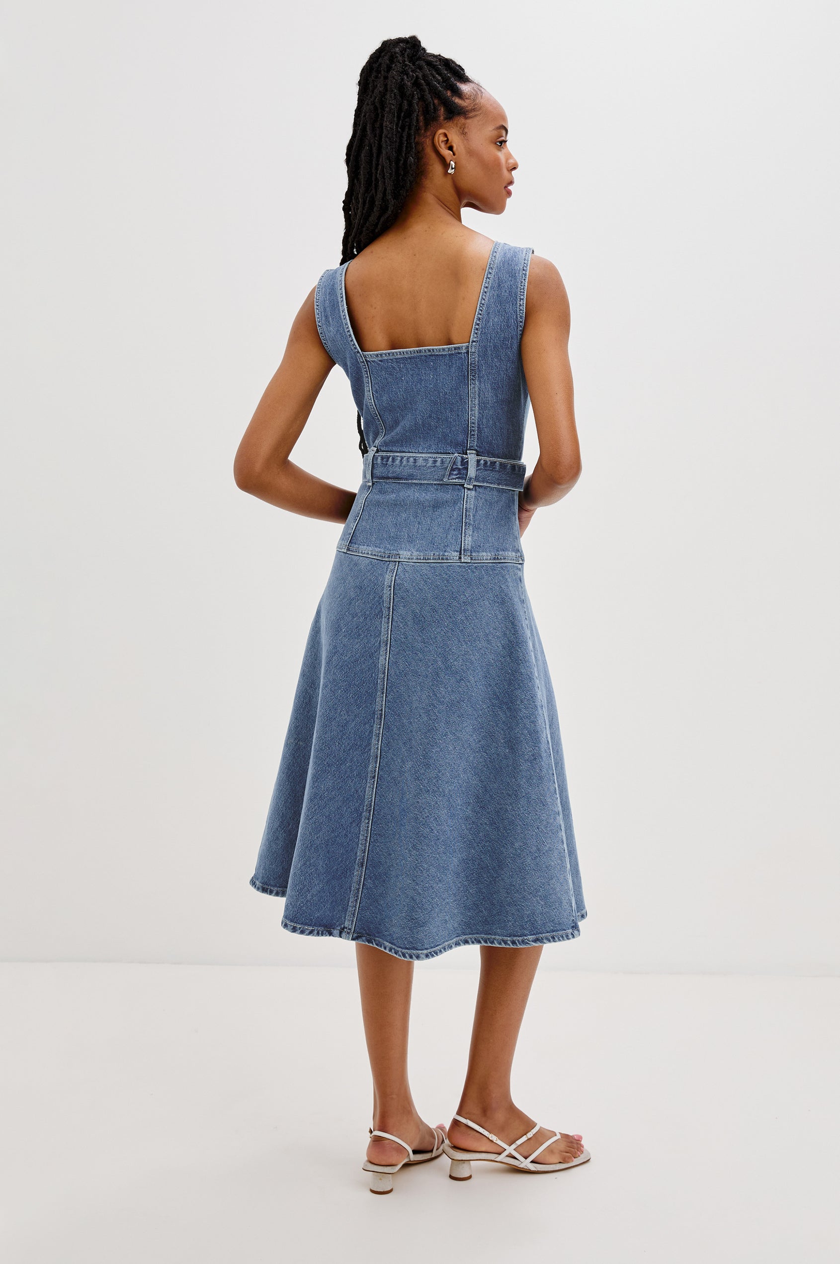 Aliso Denim Midi Dress with Square Neckline, Exposed Button Front, Belt Loops and a Self Belt with Metal D-Ring in Pacific Coast Colorway. Back View Shown on Model.