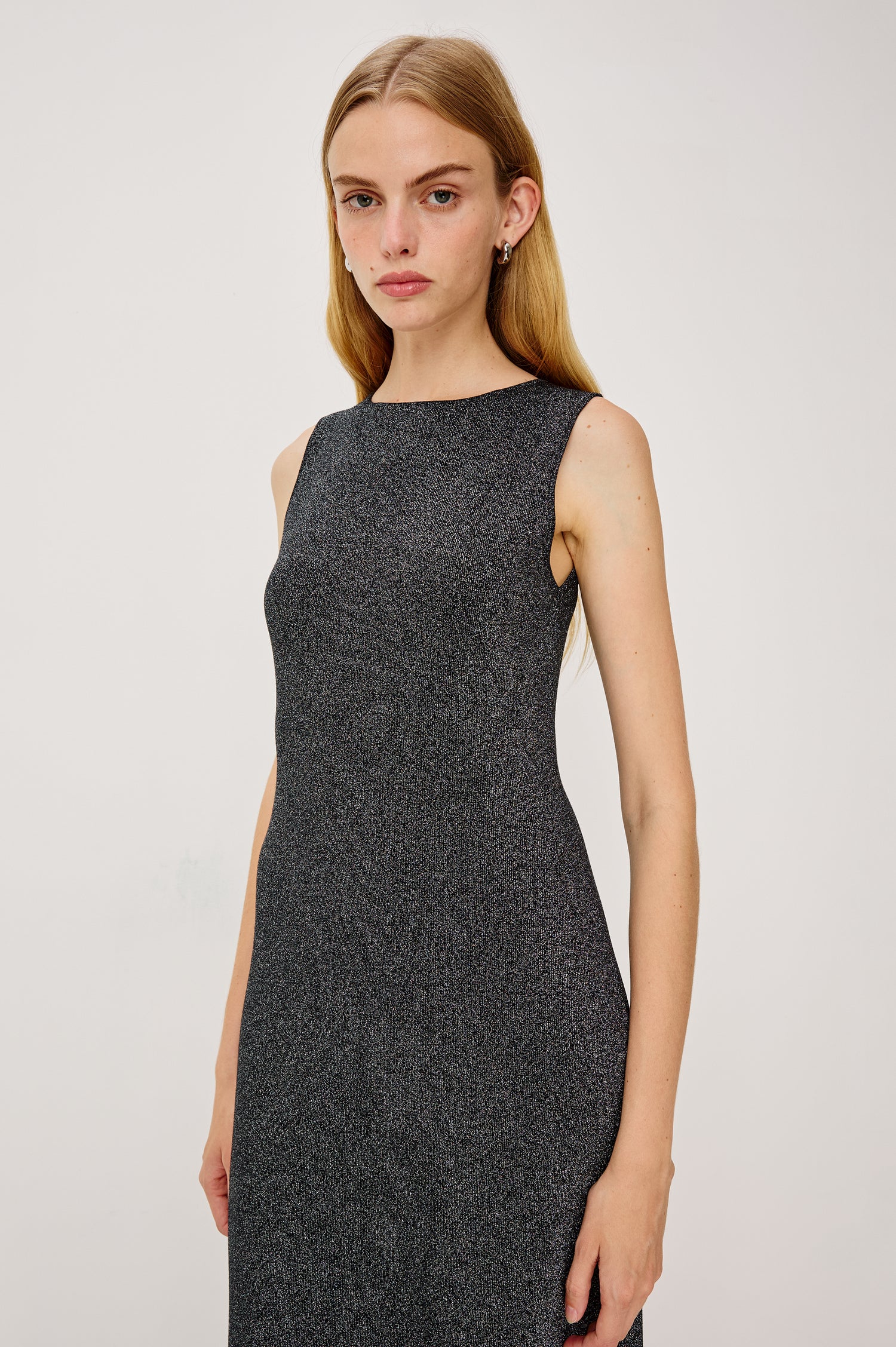 Alora Sleeveless Midi Dress in Fine Ribbed Knit With a Boat Neck and a Mid-Thigh Side Slit in Gunmetal Lurex Colorway - Full Body Front View Featured on Model