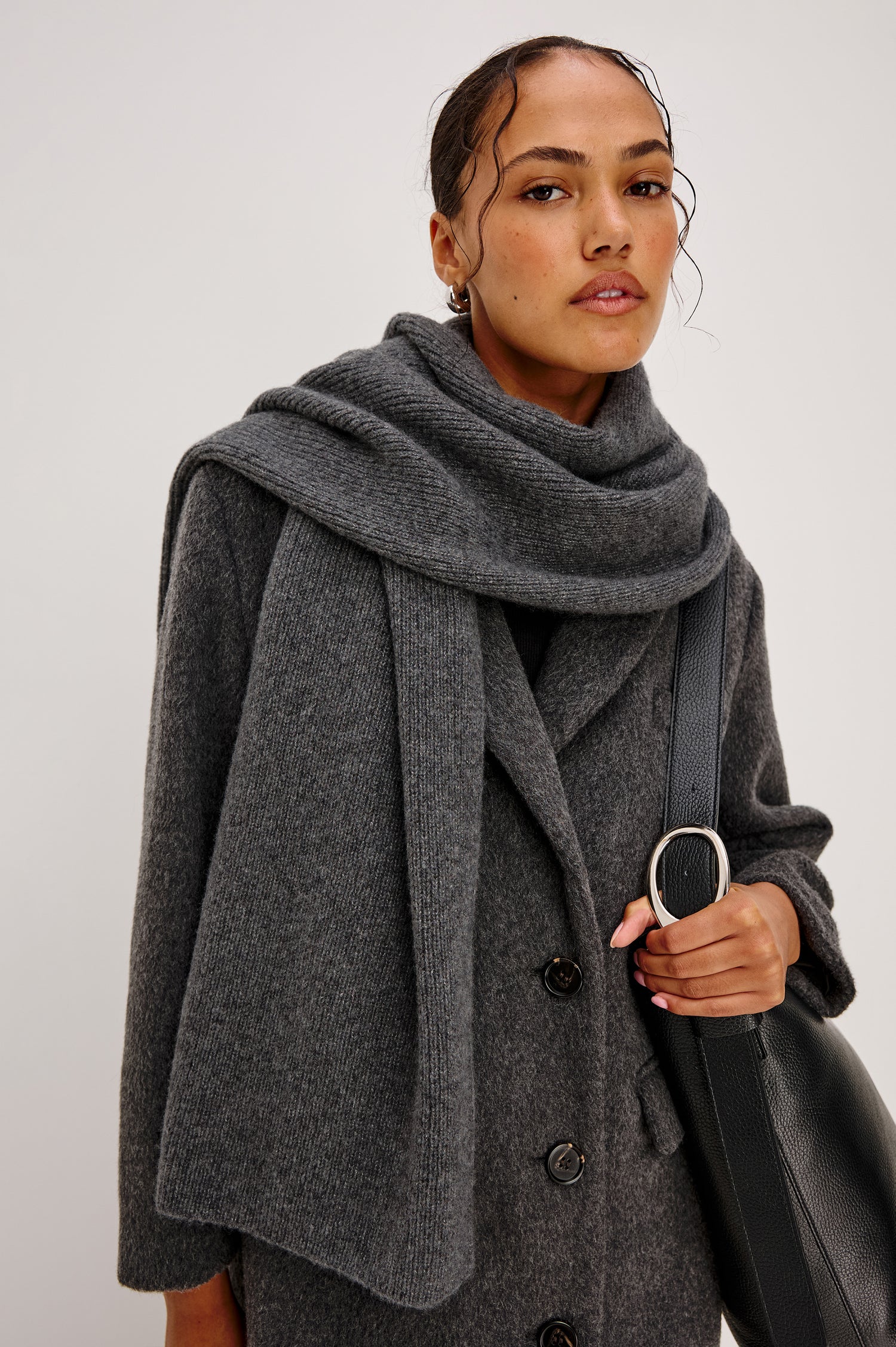 Alps cashmere silk scarf in Thunder grey colorway. Front view featured on model.