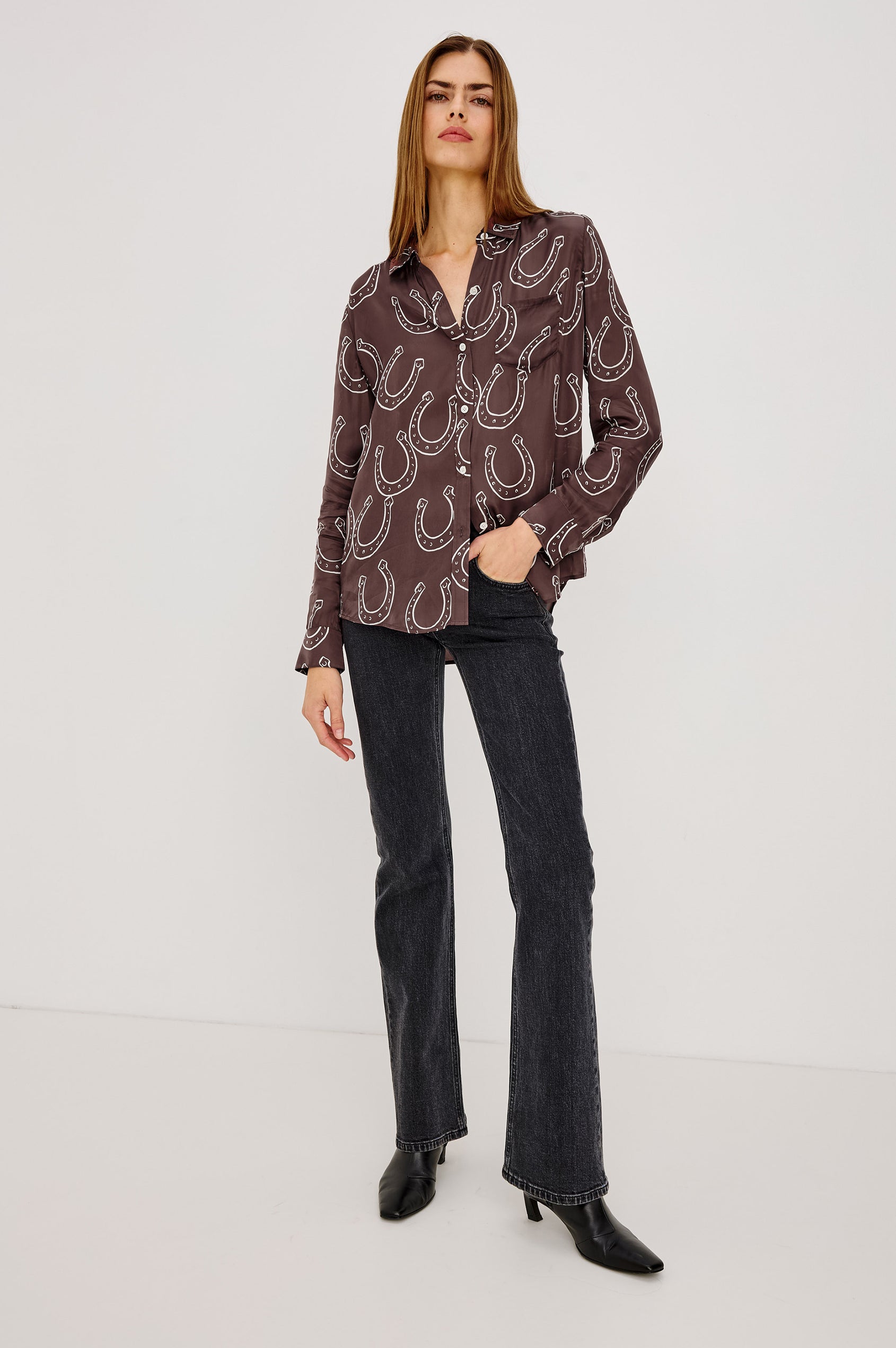 Alyssa Shirt in Luxe Lightweight Cupro With Loose Fit, Collar, Front Buttons, Long Sleeves, and Curved Back Hem in Brown Horsehoes Colorway - Full Body Front View Featured on Model