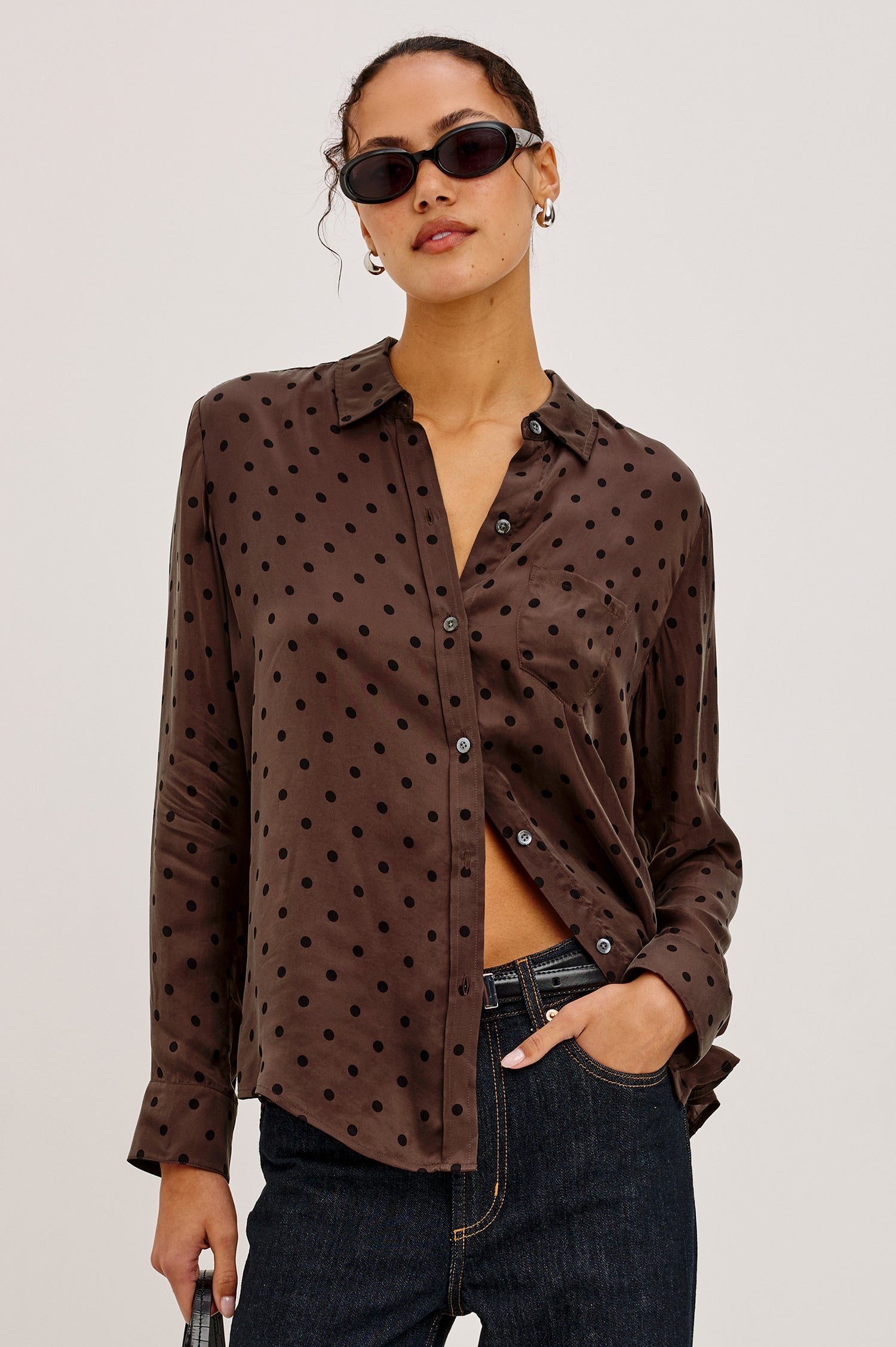 Alyssa Shirt in Luxe Lightweight Cupro With Loose Fit, Collar, Front Buttons, Long Sleeves, and Curved Back Hem in Chocolate Polka Dot Colorway - Upper Body Front View Featured on Model