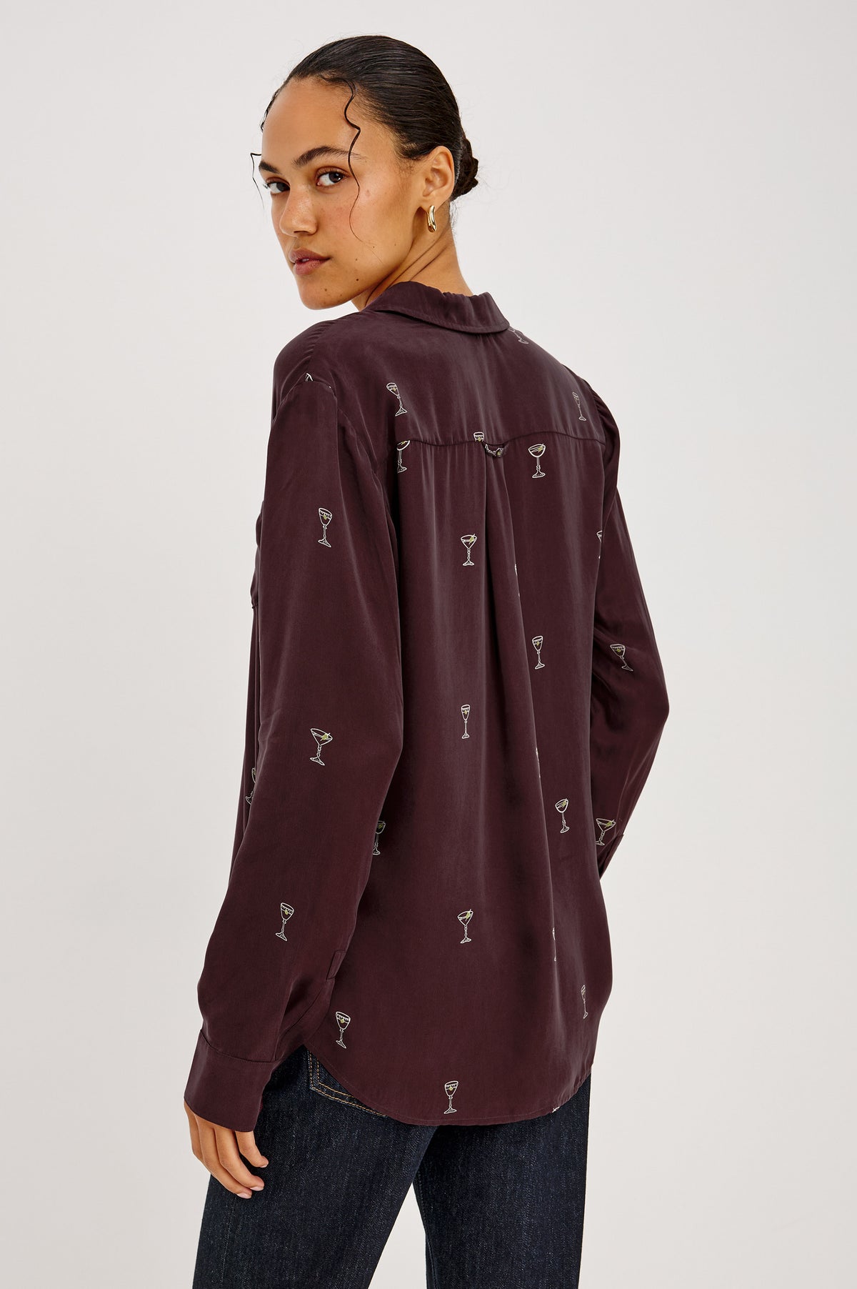 Alyssa Shirt in Martini Print Silk With Front Buttons, Single Chest Pocket, Point Collar, and Long Sleeves in Oxblood Martini Colorway - Upper Body Back View Featured on Model.