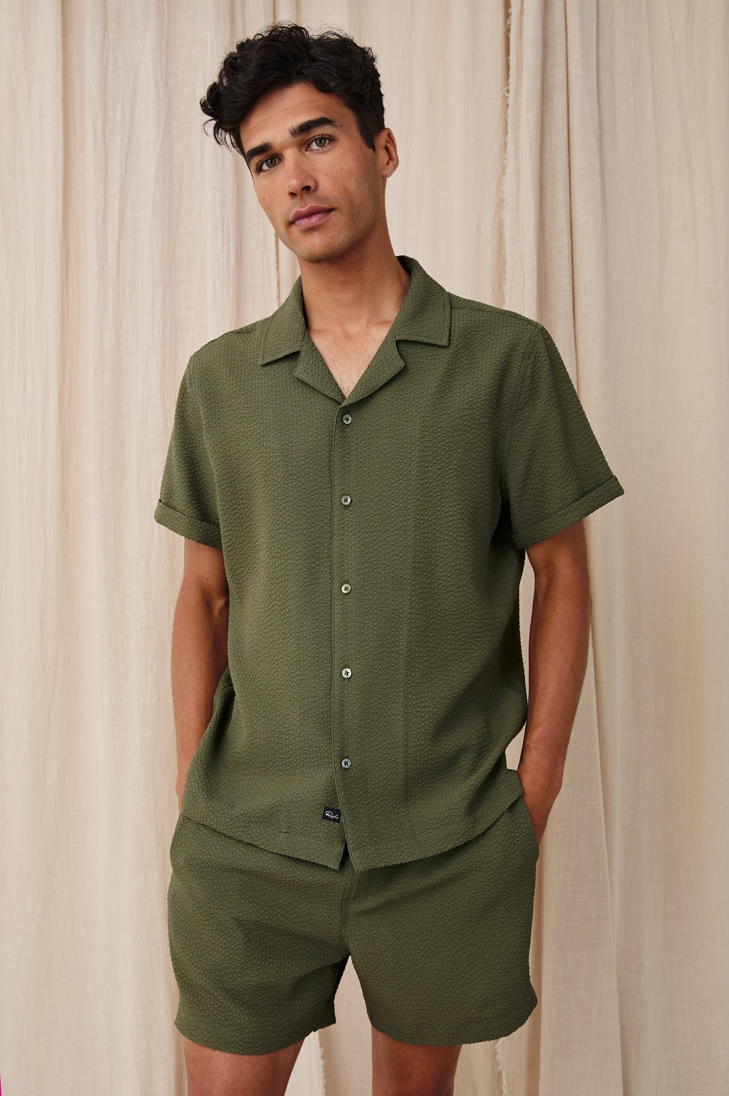 Amalfi classic fitted short sleeve button up shirt with collar in Olive Seersucker - stylized front view on model