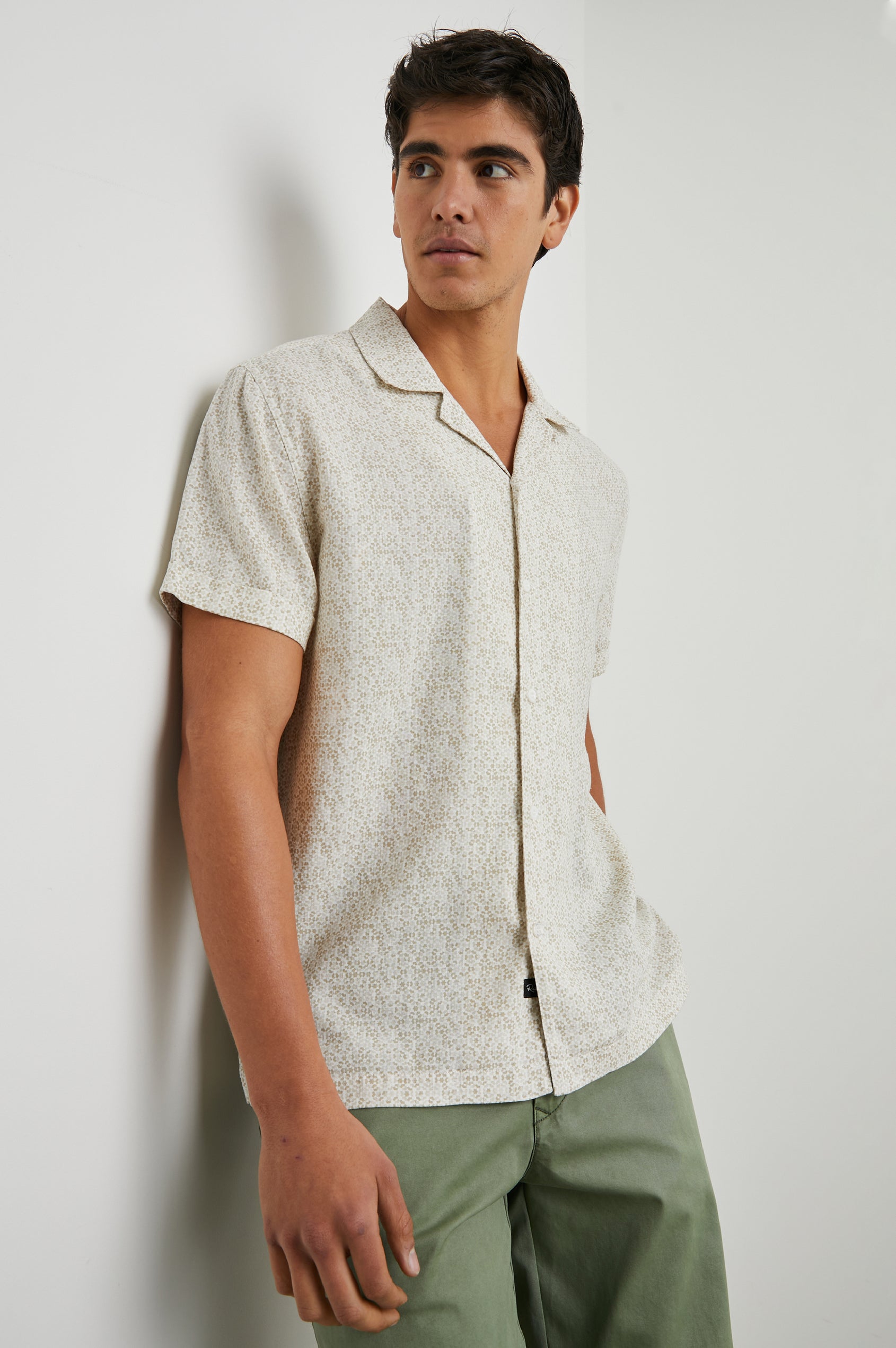 Amalfi Short-Sleeve Button Up in Painted Tile Khaki Colorway, geometric pattern in browns on khaki - Front View Featured on Model