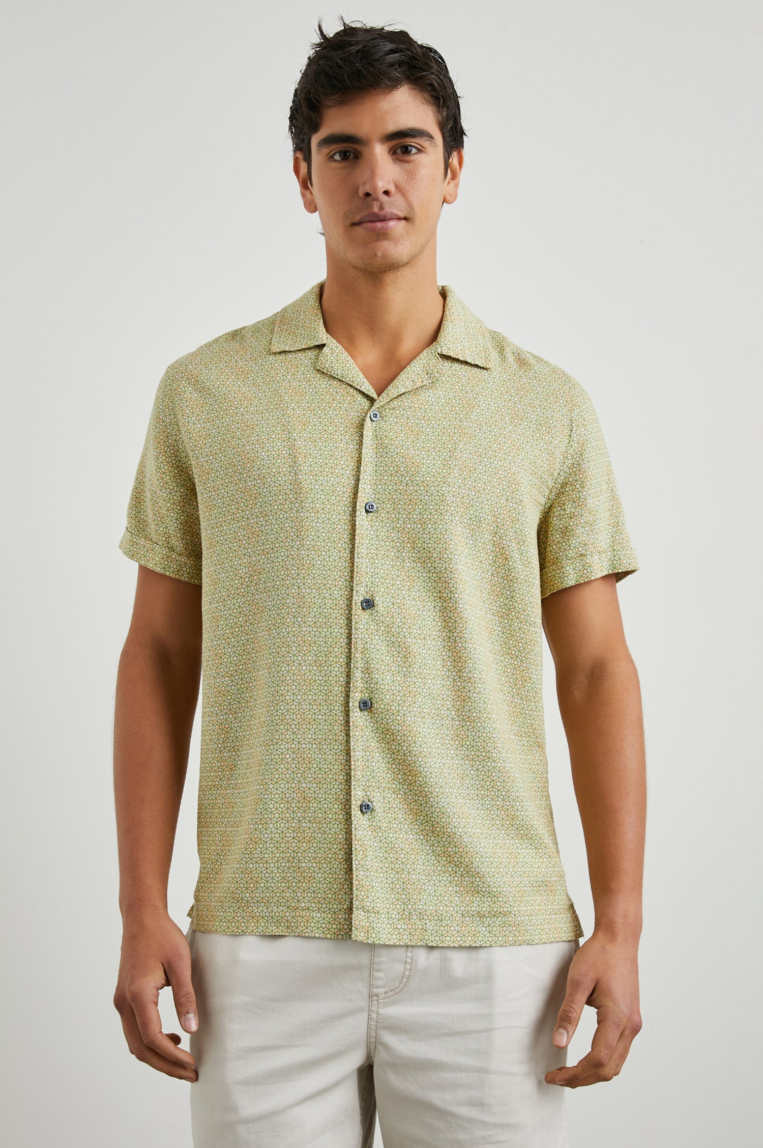 Amalfi Short-Sleeve Button Up in Painted Tile Matcha Colorway, green and peach geometric pattern on matcha  - Front View Featured on Model