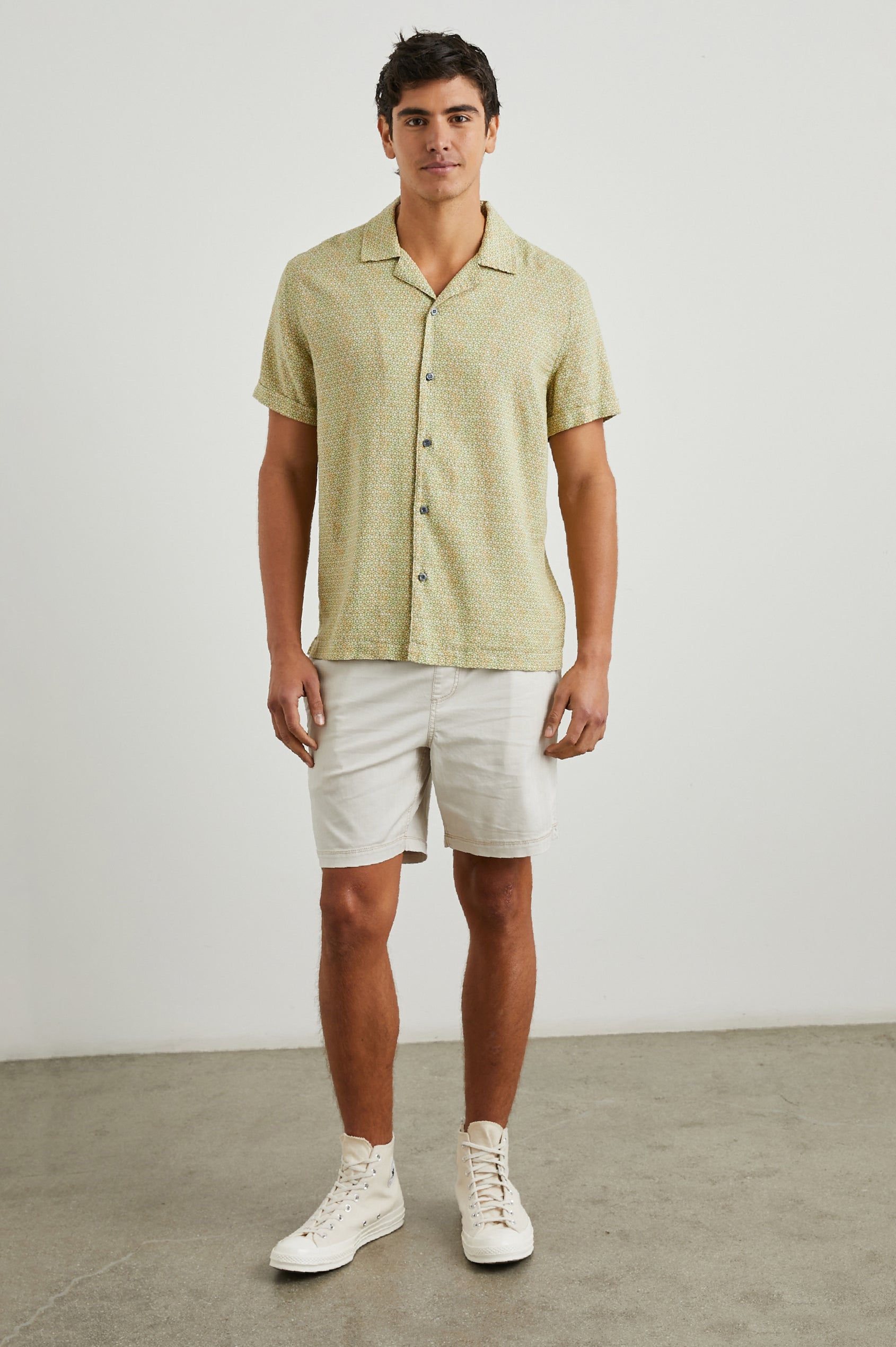 Amalfi Short-Sleeve Button Up in Painted Tile Matcha Colorway, green and peach geometric pattern on matcha  - Front Full Body View Featured on Model