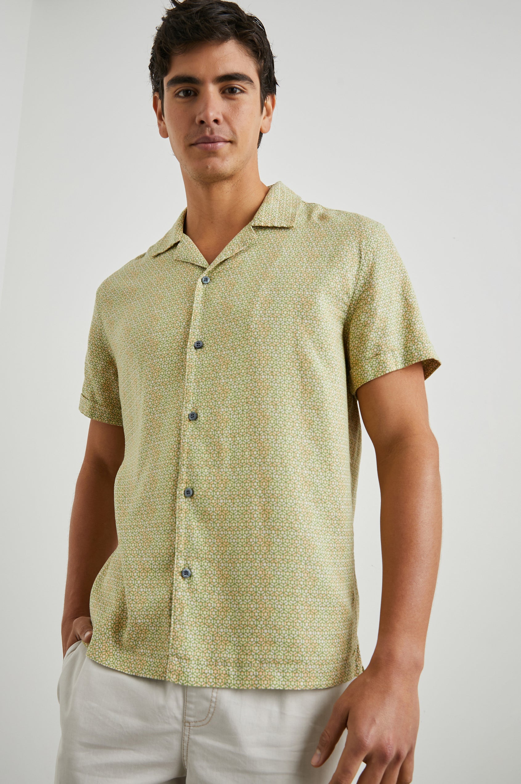 Amalfi Short-Sleeve Button Up in Painted Tile Matcha Colorway, green and peach geometric pattern on matcha  - Front View Featured on Model