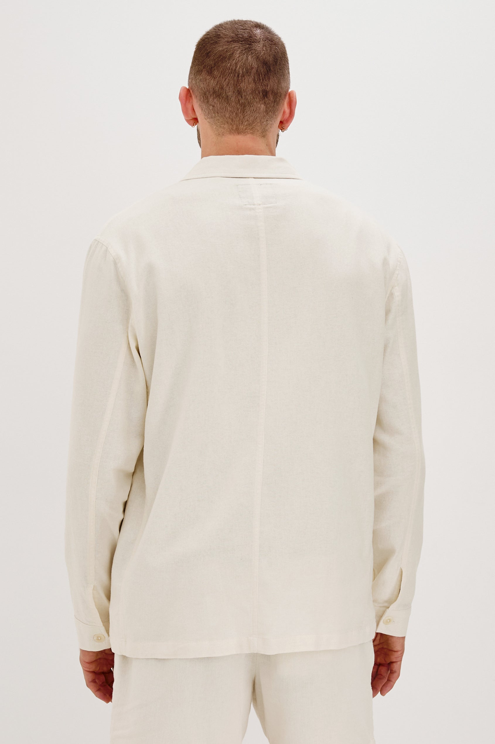 Ambrose Button Front Chore Jacket with front Patch Pockets in Ecru Colorway. Back View Shown on Model.