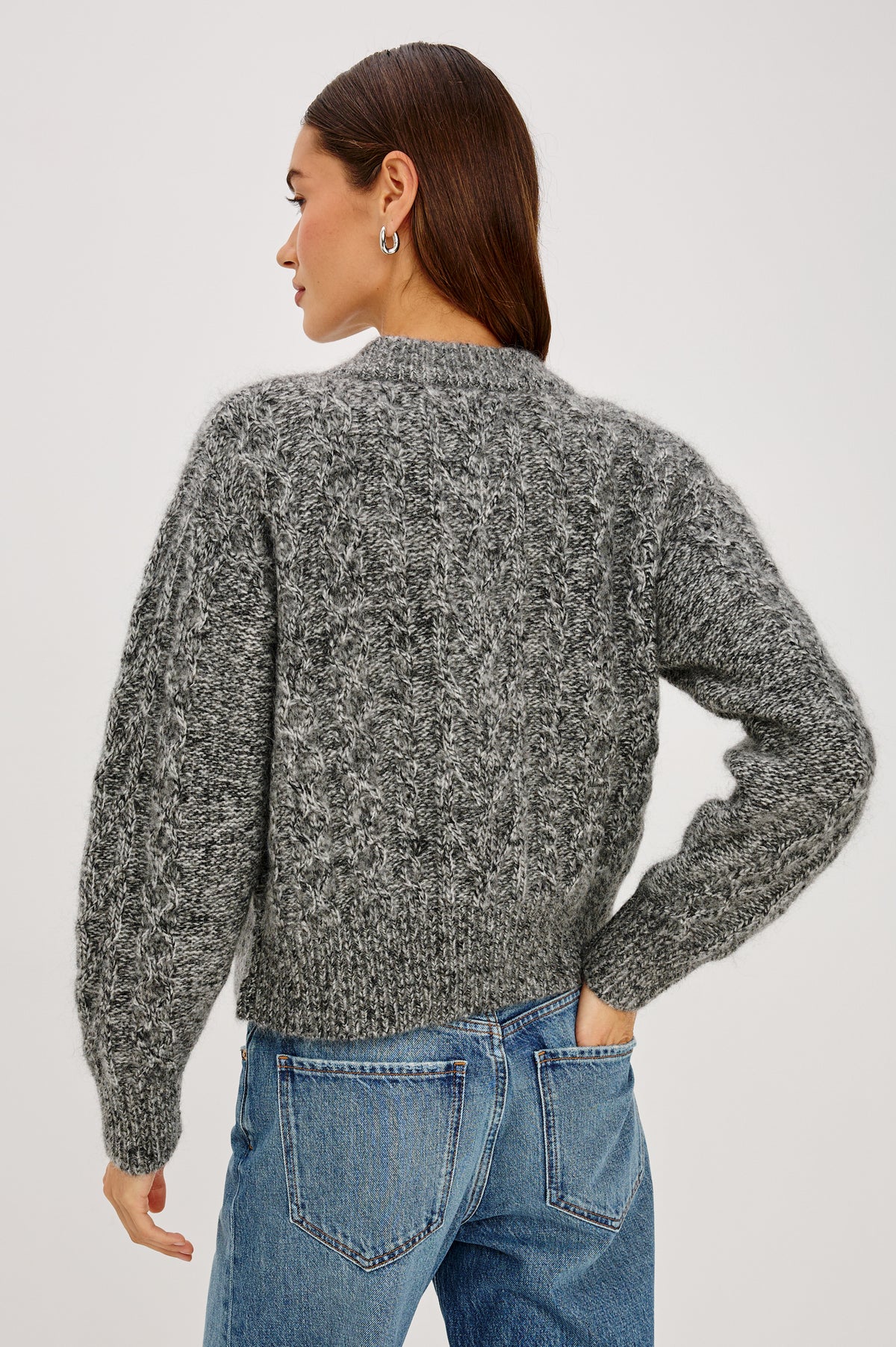 Amelie Cardigan in Cable Knit Wool-Cotton Blend, Crewneck, and Front Button Closure in Grey Colorway - Upper Body Back View Featured on Model
