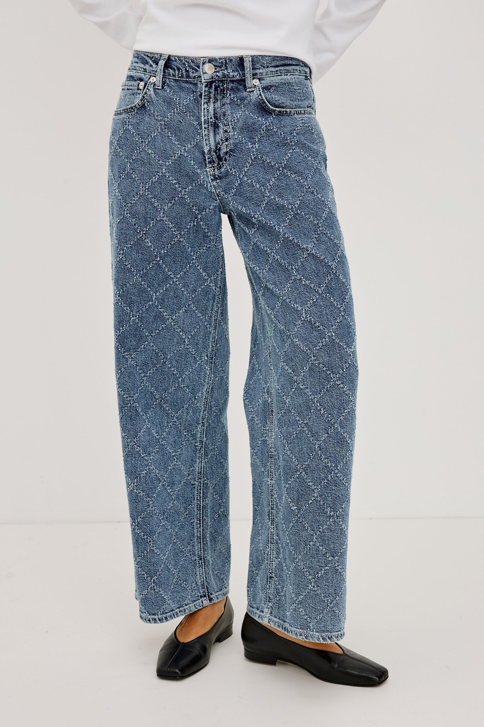 Angeleno Wide Leg Crop Jean in Rigid Drapey Denim With Mid-Rise Cropped Fit, 5-Pockets, Self-Tie Shoelace Belt, Frayed Waistband, and Zip-and-Hook Closure in Dark Diamond Distress Colorway - Lower Body Front View Featured on Model