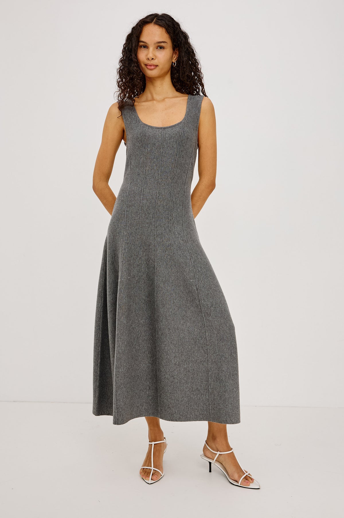 Angelica Maxi Dress in Soft Wool Blend With Fitted Bodice, Scoop Neck, Paneled Seams, and A-Line Sweep Skirt in Heather Grey Colorway - Full Body Front View Featured on Model Stylized