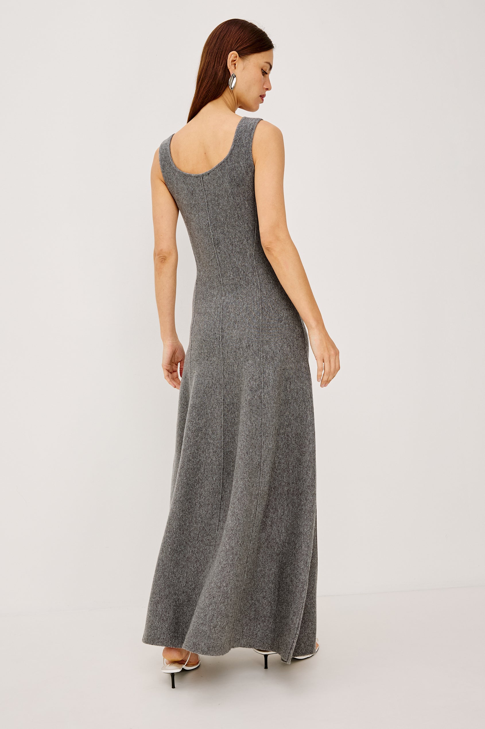 Angelica Maxi Dress in Soft Wool Blend With Fitted Bodice, Scoop Neck, Paneled Seams, and A-Line Sweep Skirt in Heather Grey Colorway - Full Body Back View Featured on Model