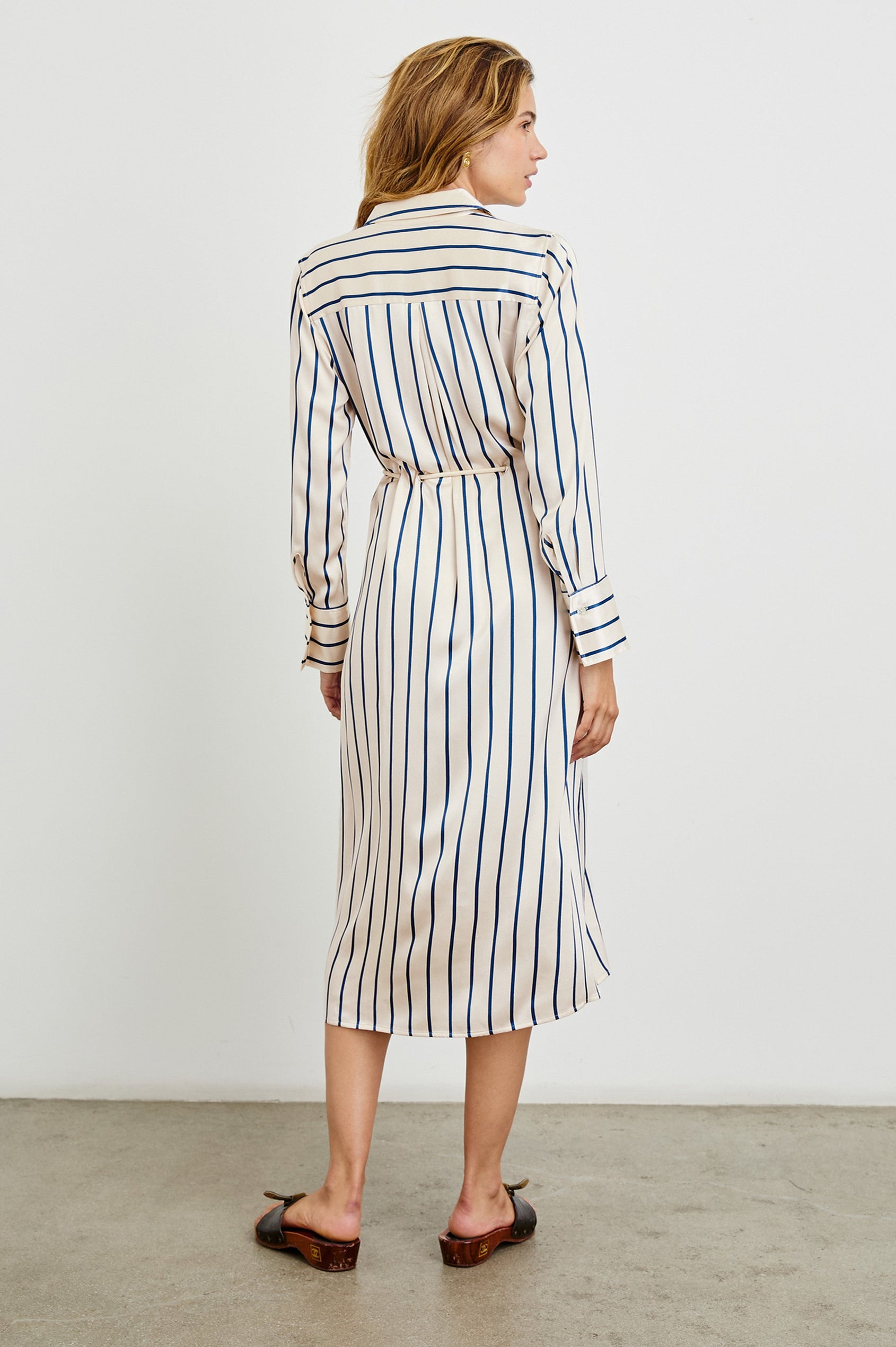 Anina Long-Sleeve Midi Dress with Buttons Down the Front, a Collar, Button Cuffs, and a Cord Belt in Ceramic Navy Stripe Colorway, Vertical Stripes - Back Full Body View Featured on Model