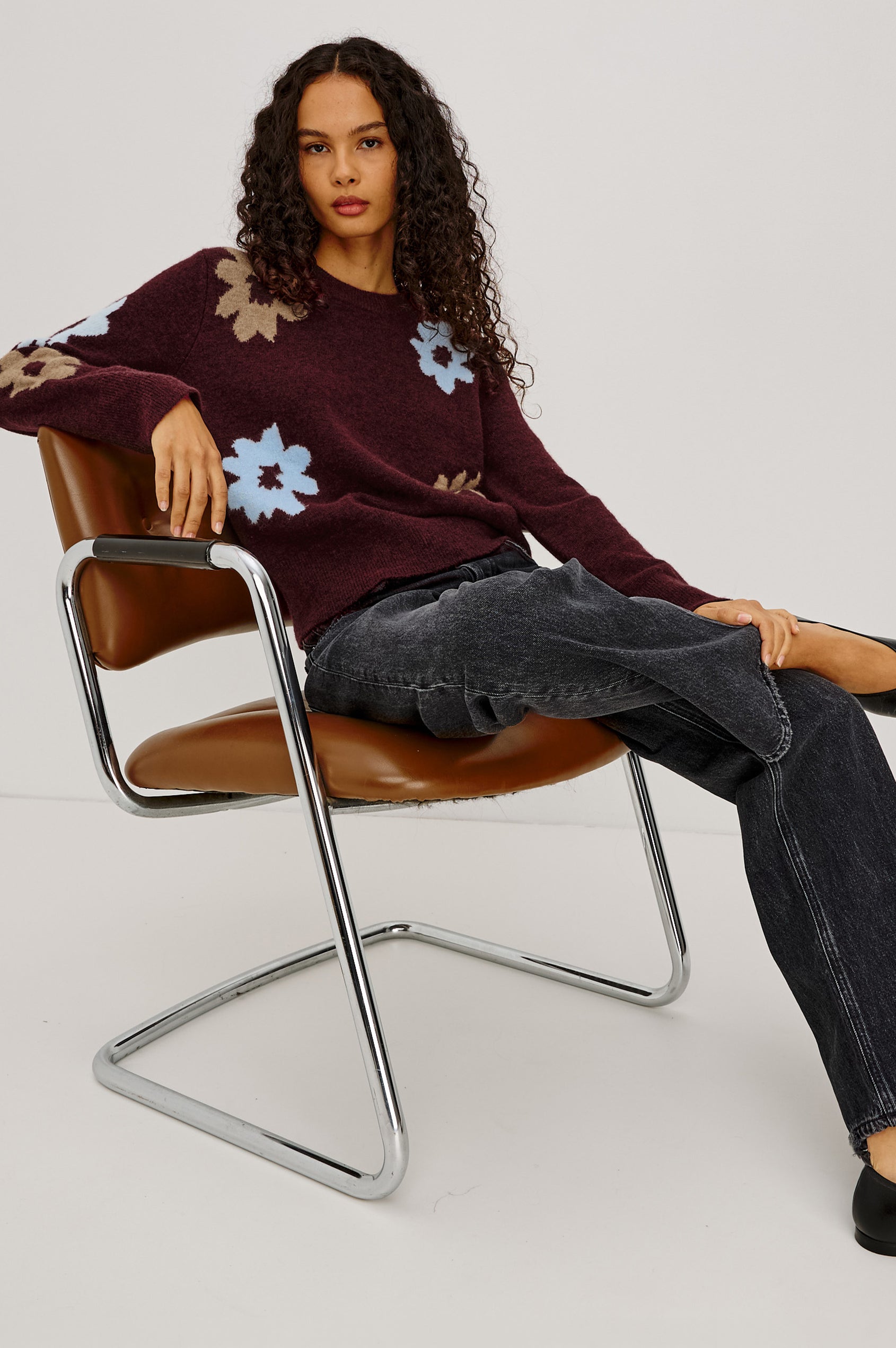 Anise Sweater in Wool-Cashmere Blend With Slightly Cropped Fit, Floral Intarsia All Over, and Ribbed Trim in Burgundy Sunflower Colorway - Full Body View Featured on Model