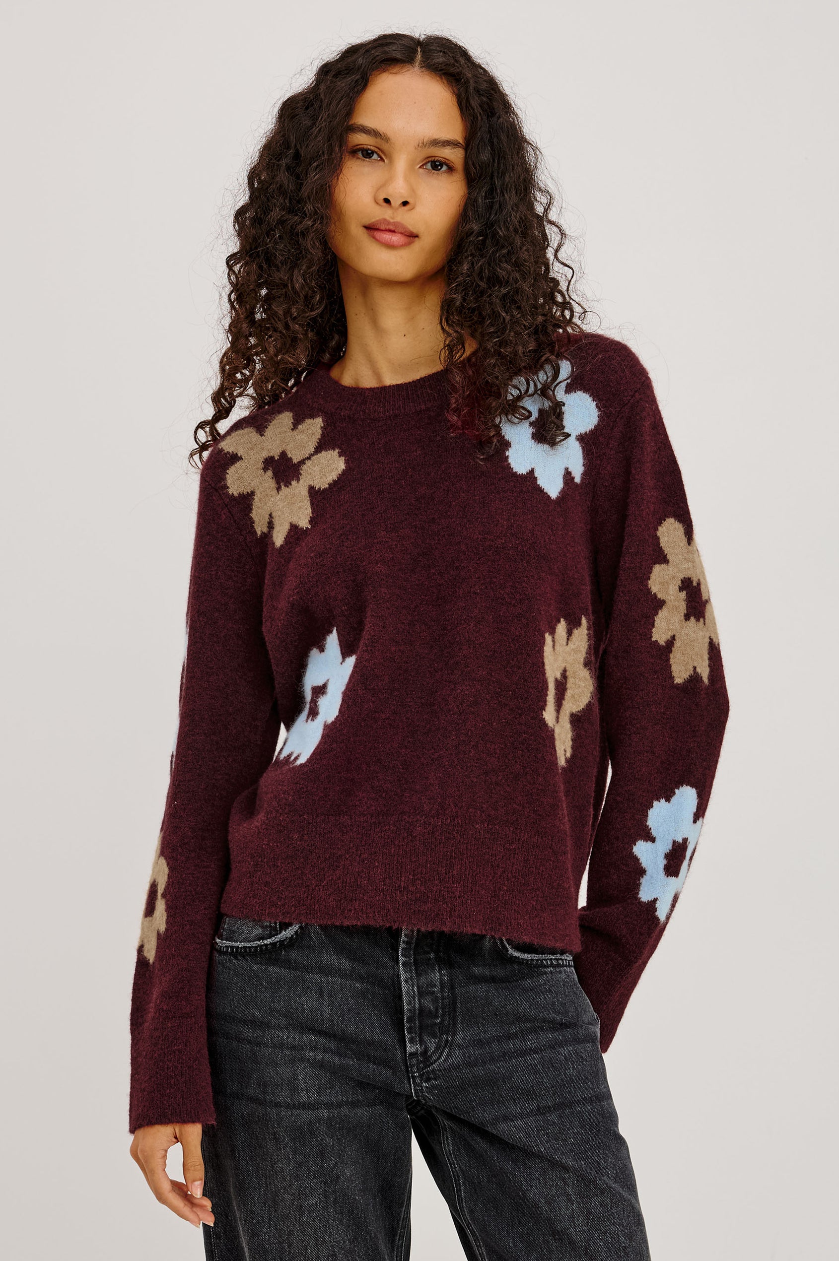 Anise Sweater in Wool-Cashmere Blend With Slightly Cropped Fit, Floral Intarsia All Over, and Ribbed Trim in Burgundy Sunflower Colorway - Upper Body Front View Featured on Model