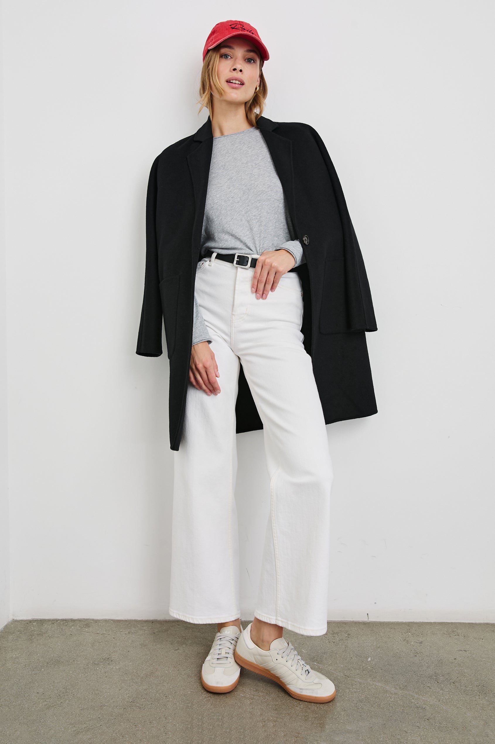 Anniversary Baseball Cap with an Adjustable Back Strap, Front Text, Rails, and Back Text, Est 2009, in Washed Red Colorway, with Blue Text - Front Full Body View Featured on Model