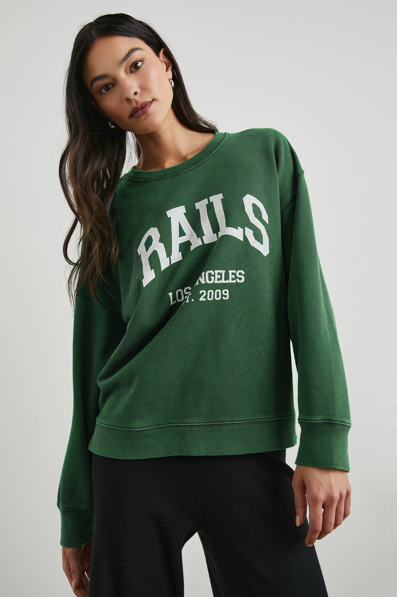Anniversary Sweatshirt with Crewneck, Text States, Rails Los Angeles Est 2009, in Forest Colorway with White Letters - Front View Featured on Model 