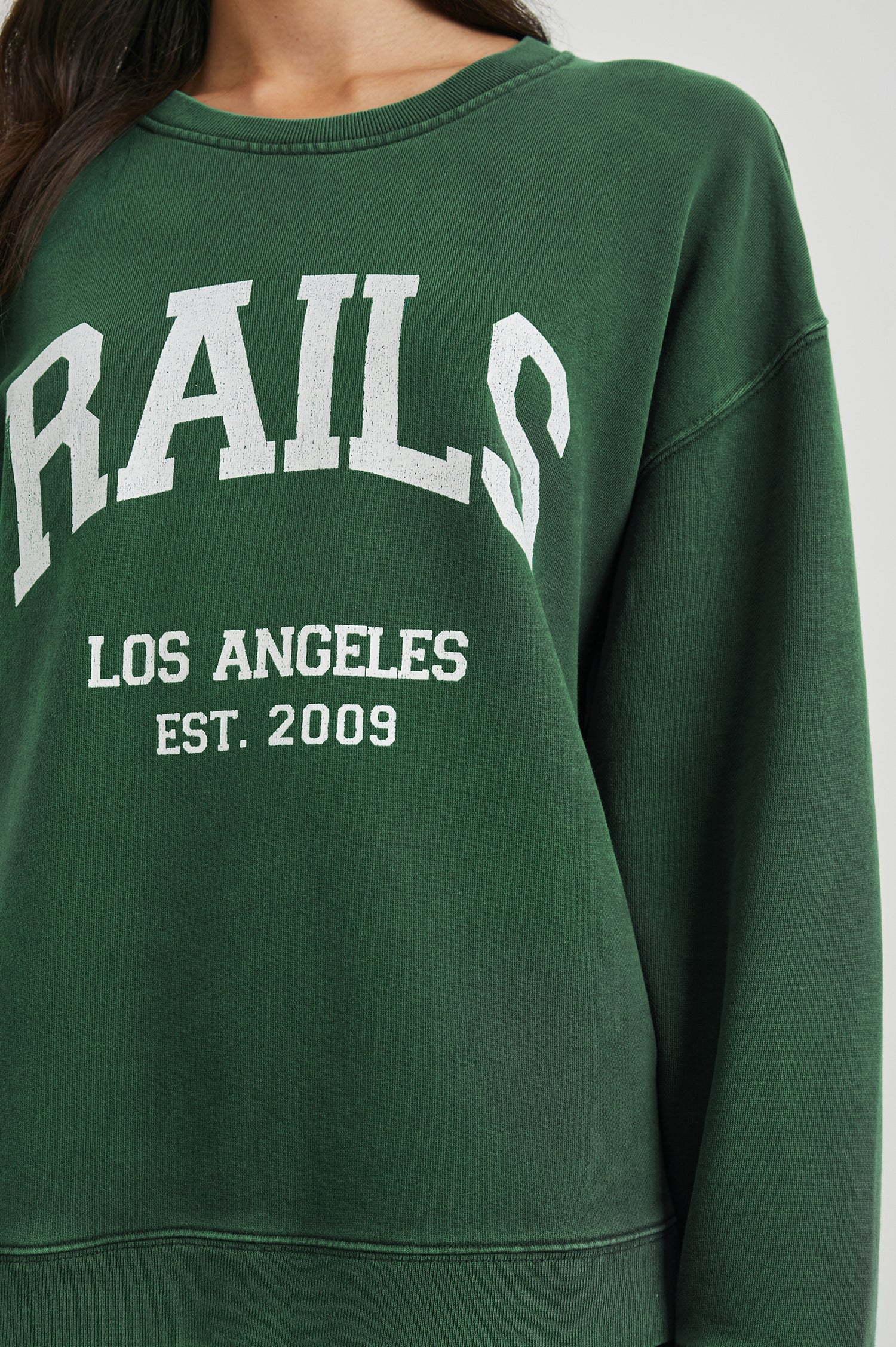 Anniversary Sweatshirt with Crewneck, Text States, Rails Los Angeles Est 2009, in Forest Colorway with White Letters - Front View Featured on Model 