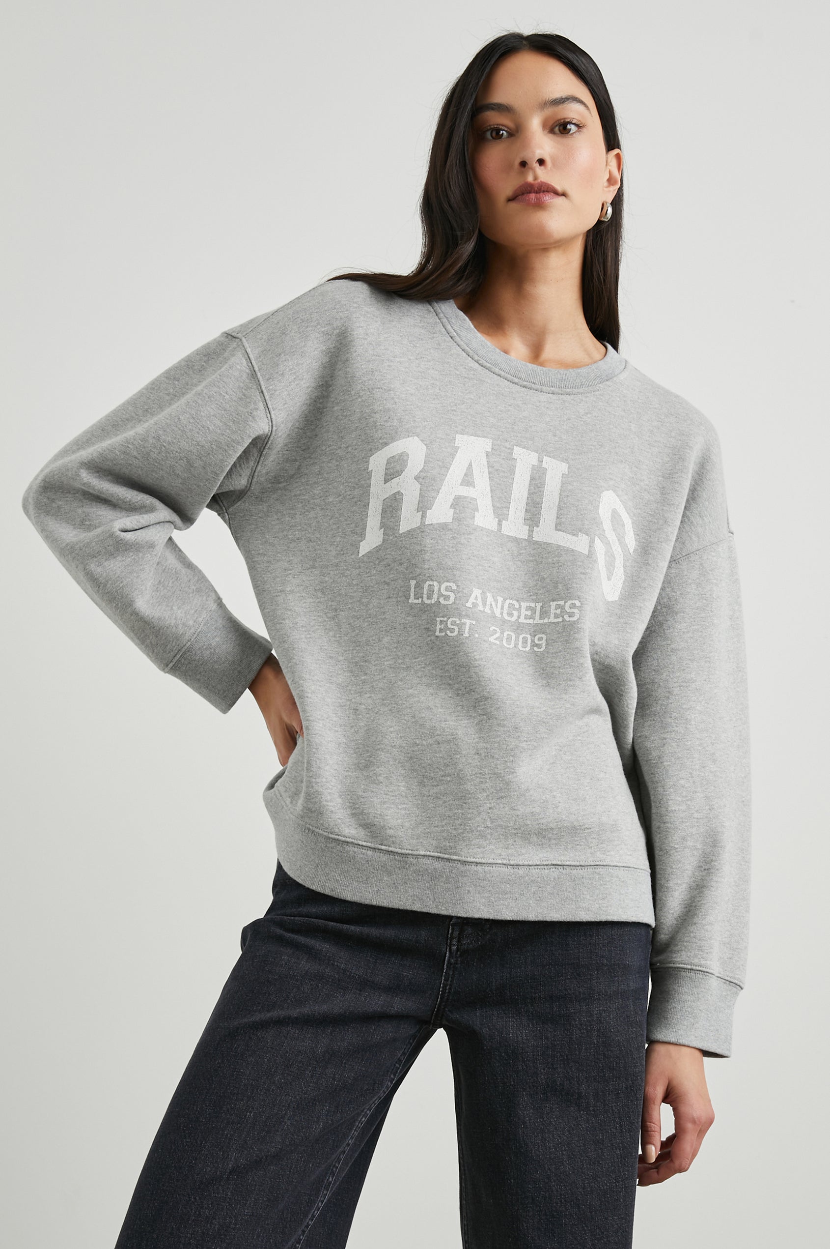 Anniversary Sweatshirt with Crewneck, Text States, Rails Los Angeles Est 2009, in Heather Grey Colorway with White Letters - Front View Featured on Model 
