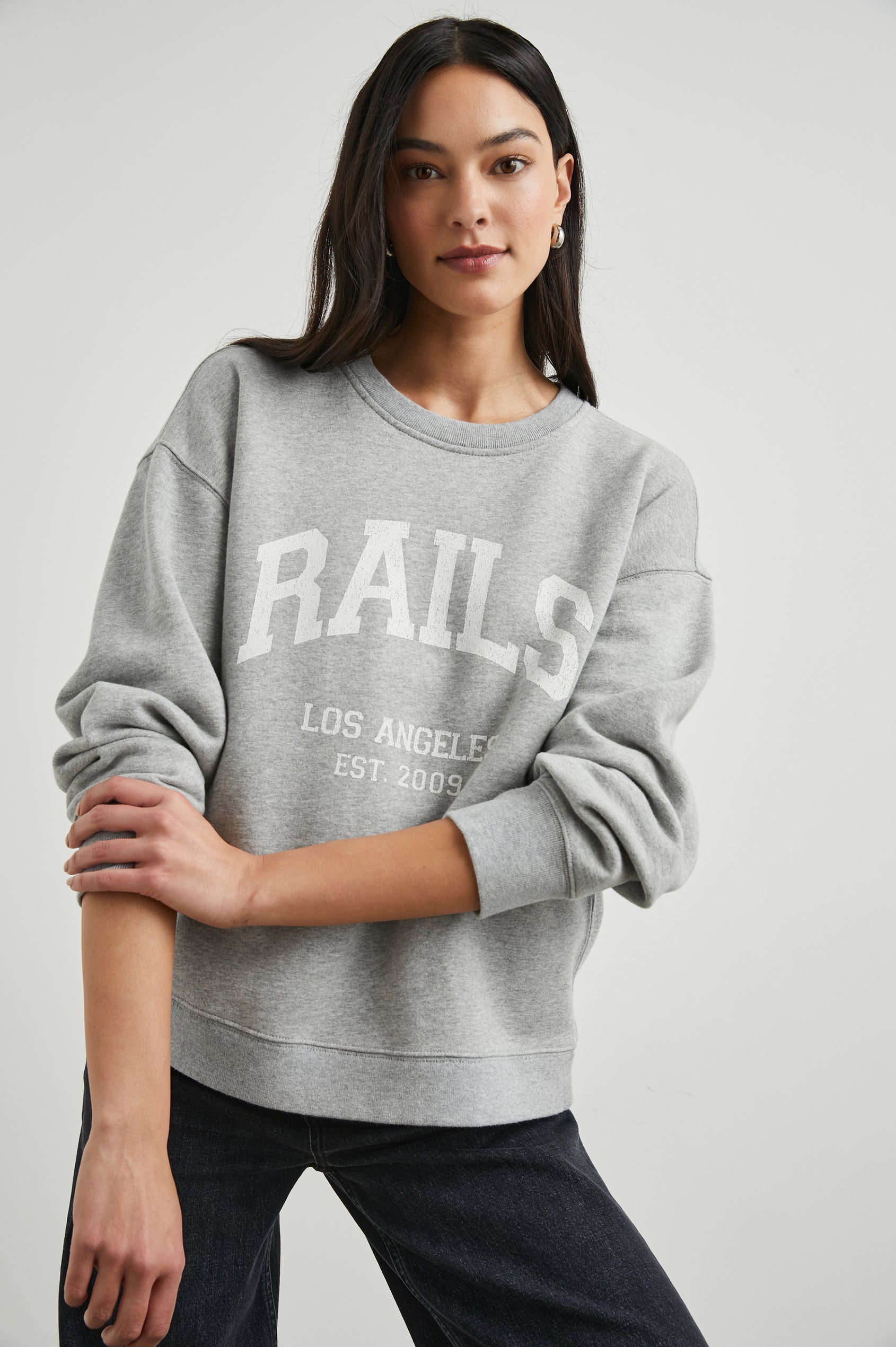 Anniversary Sweatshirt with Crewneck, Text States, Rails Los Angeles Est 2009, in Heather Grey Colorway with White Letters - Front View Featured on Model 