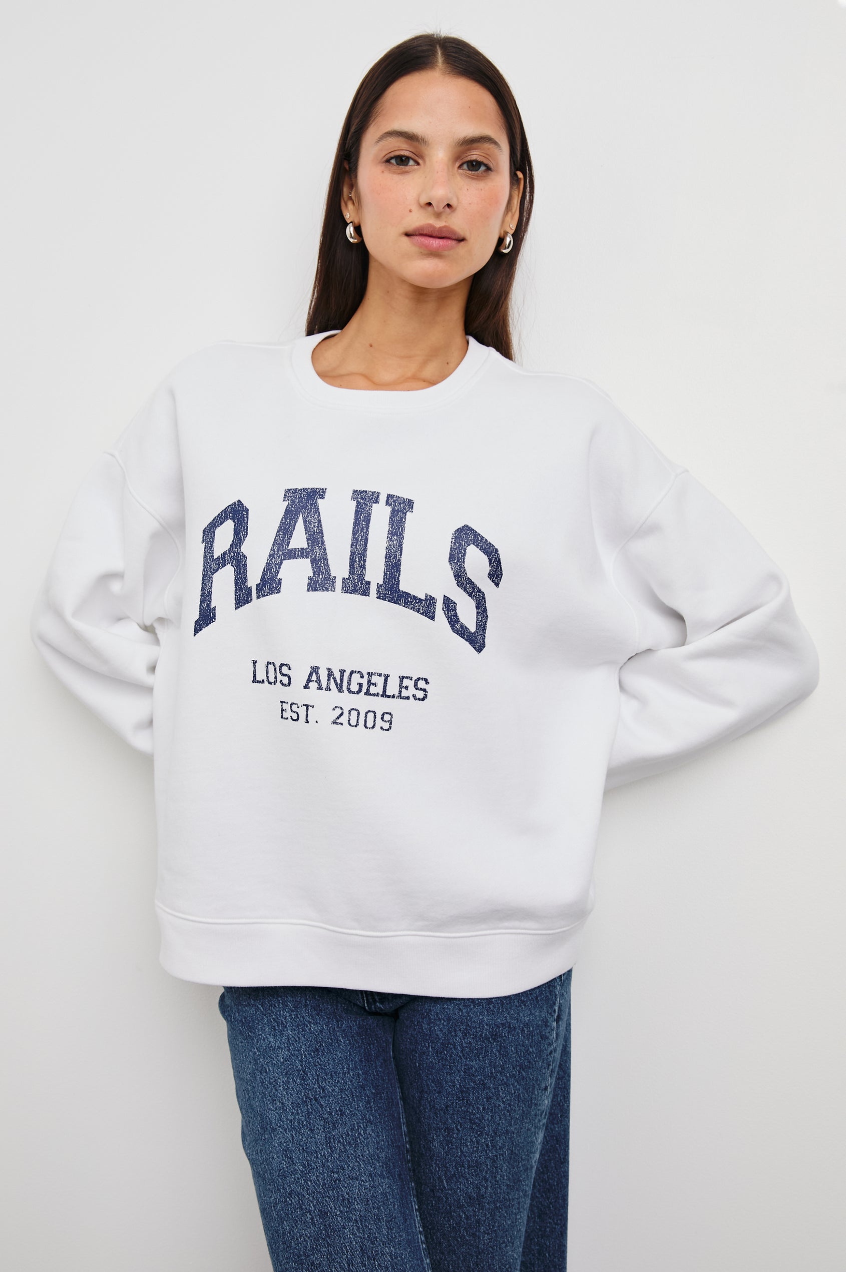 Anniversary Sweatshirt with Crewneck, Text States, Rails Los Angeles Est 2009, in Ivory Colorway with Navy Letters - Front View Featured on Model 