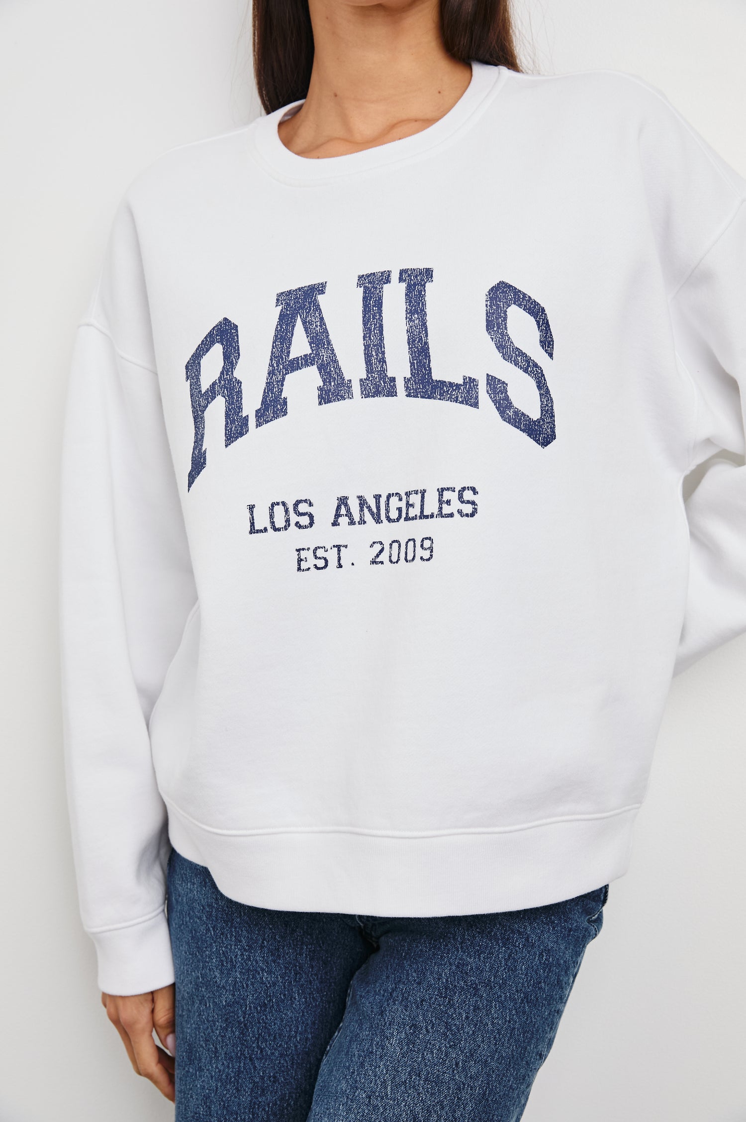 Anniversary Sweatshirt with Crewneck, Text States, Rails Los Angeles Est 2009, in Ivory Colorway with Navy Letters - Front View Featured on Model 