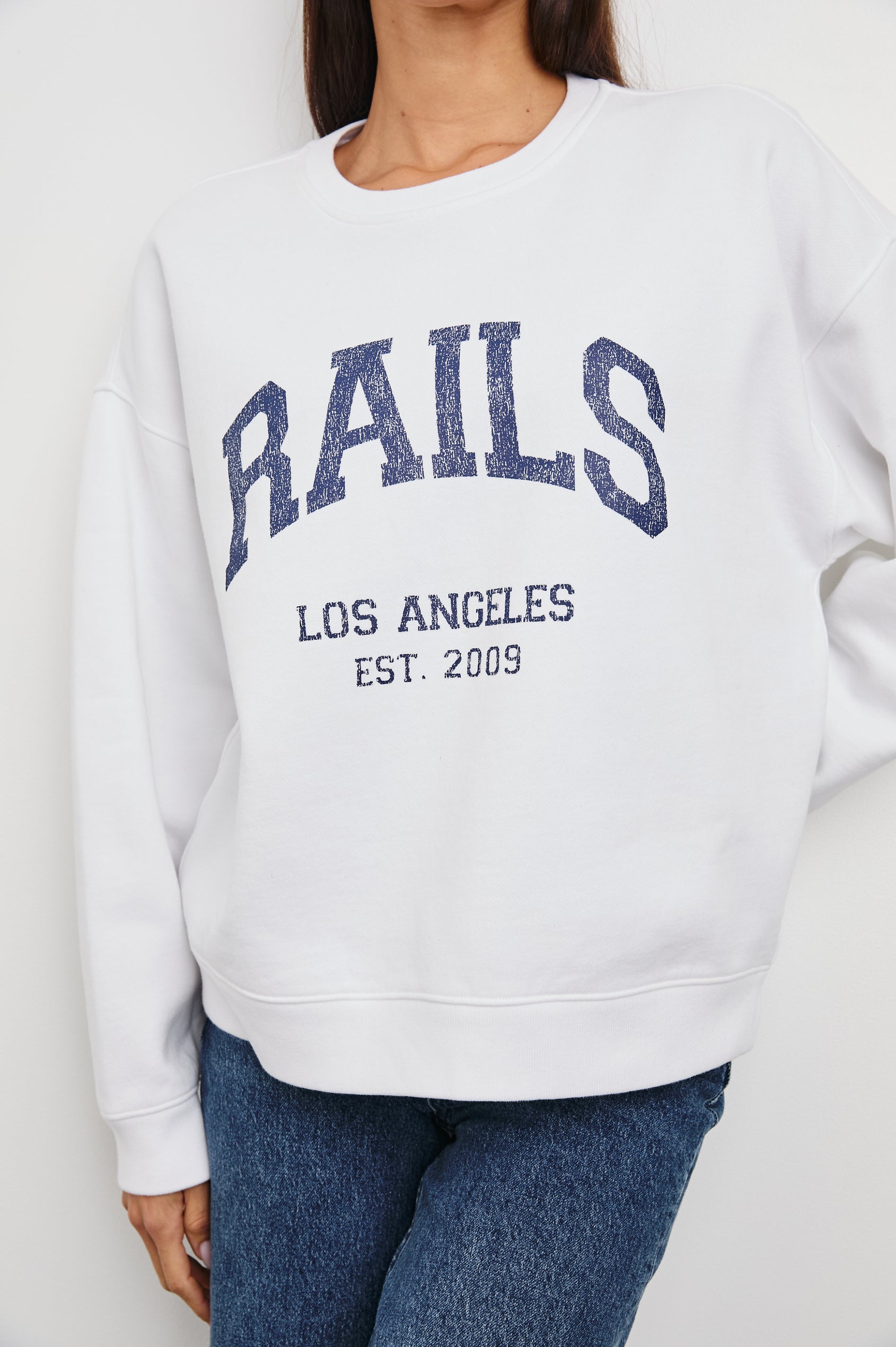 Anniversary Sweatshirt with Crewneck, Text States, Rails Los Angeles Est 2009, in Ivory Colorway with Navy Letters - Front View Featured on Model 