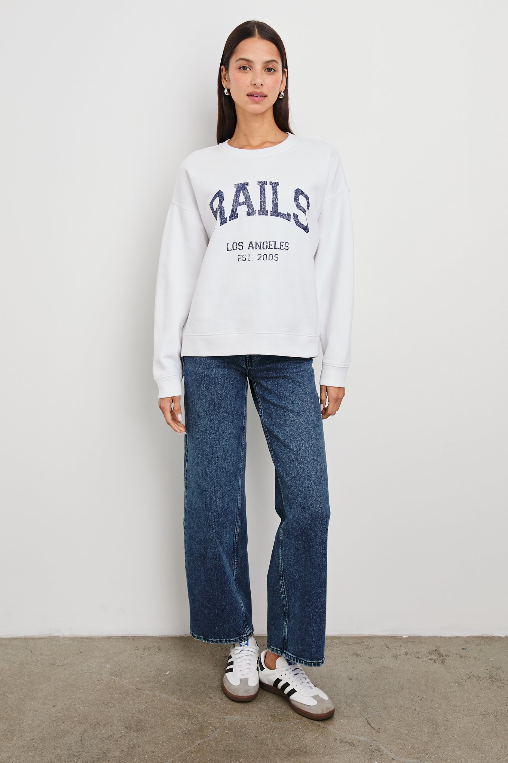 Anniversary Sweatshirt with Crewneck, Text States, Rails Los Angeles Est 2009, in Ivory Colorway with Navy Letters - Front Full Body View Featured on Model 